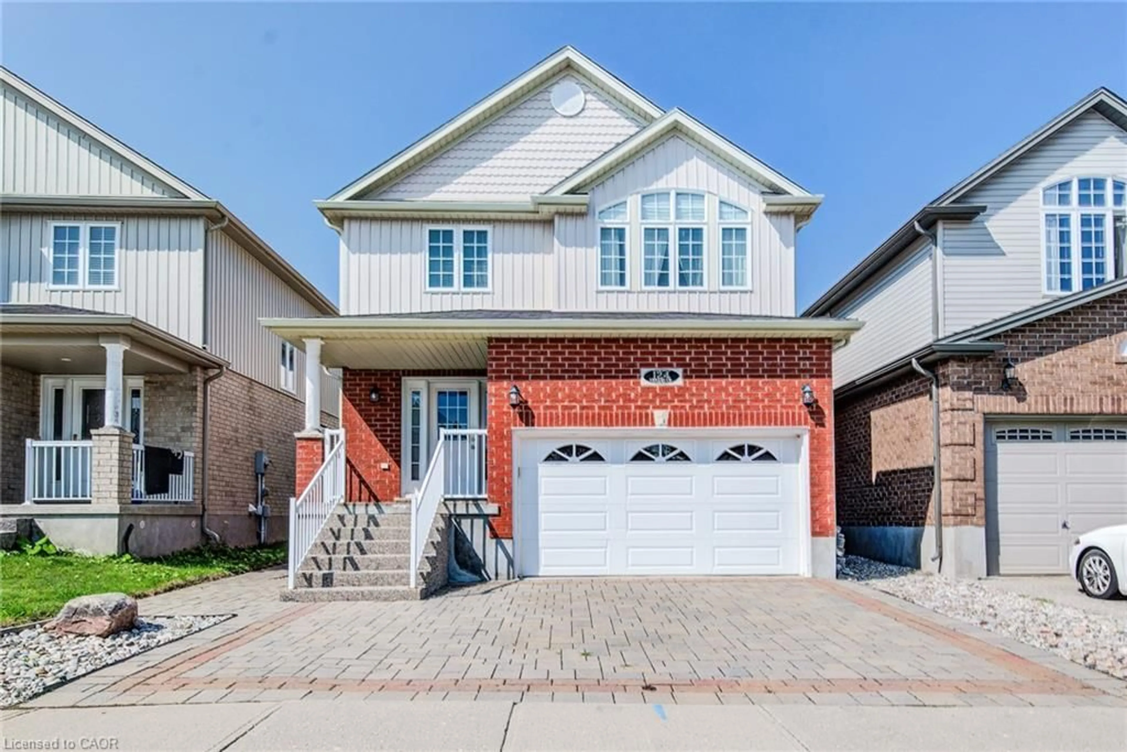 Home with brick exterior material, street for 124 Udvari Cres, Kitchener Ontario N2N 3P6