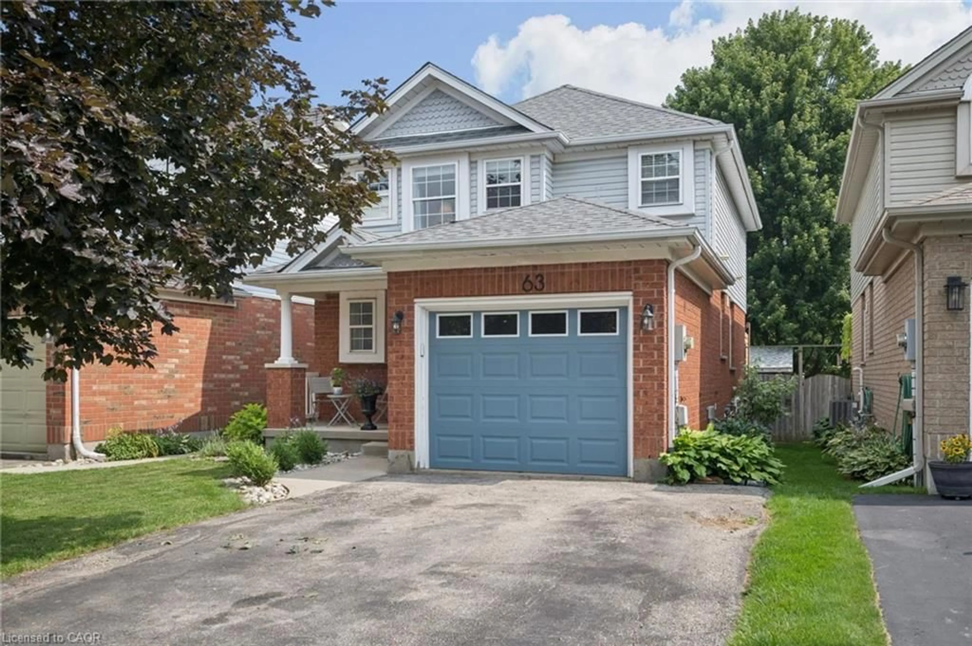 Home with brick exterior material, street for 63 Starview Cres, Guelph Ontario N1E 6Z8