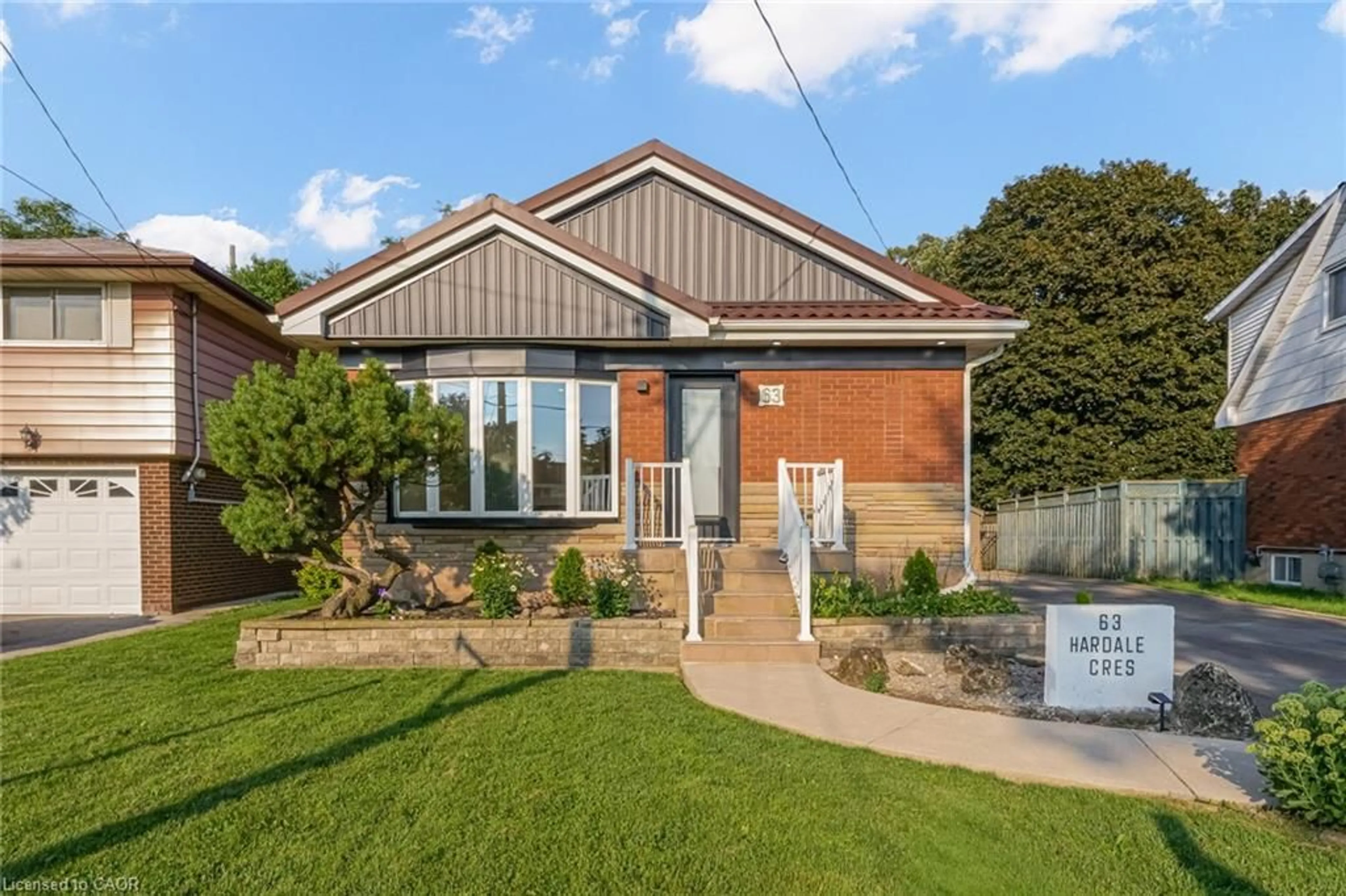 Home with brick exterior material, street for 63 Hardale Cres, Hamilton Ontario L8T 1K9