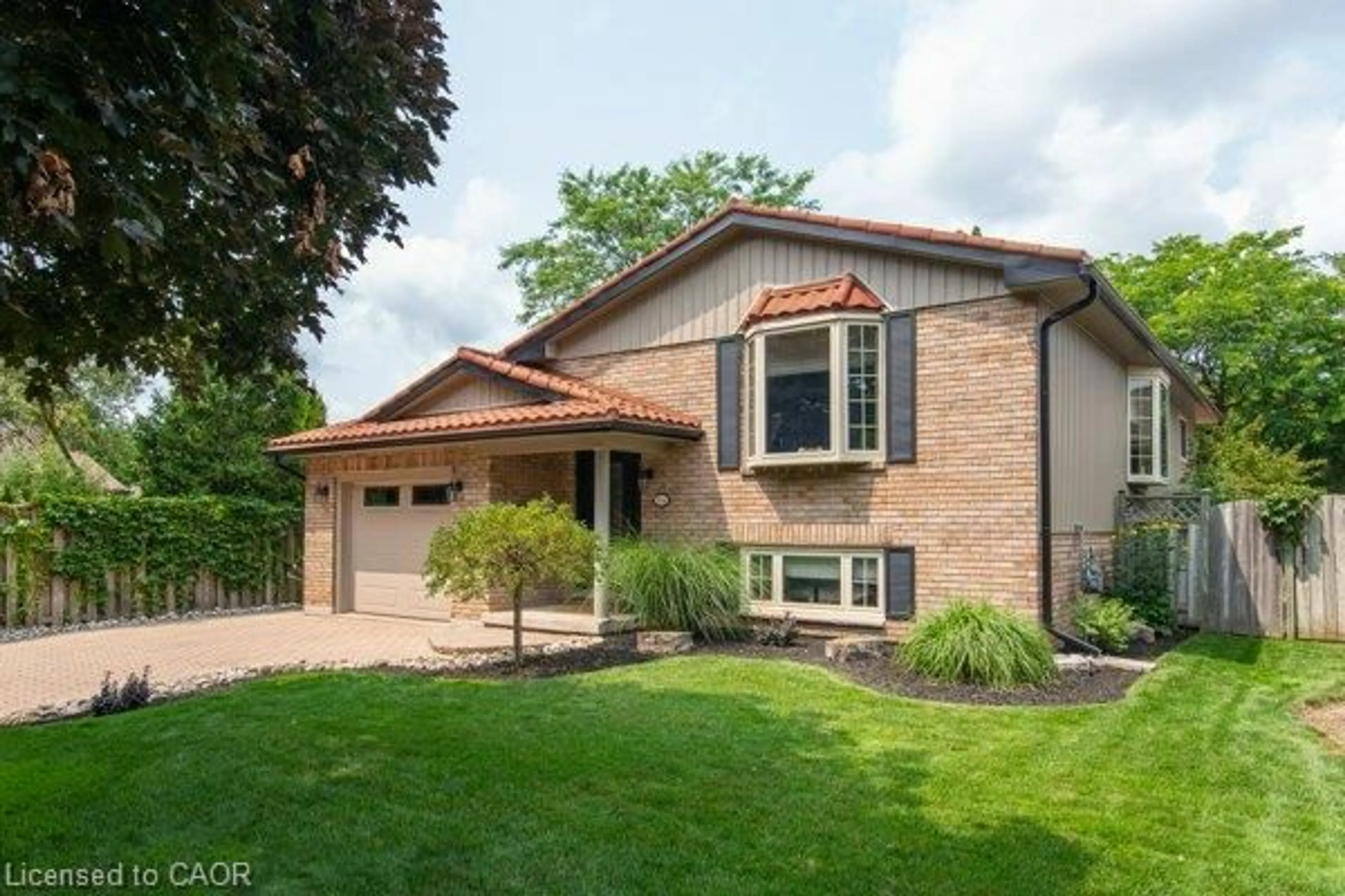 Home with brick exterior material, street for 154 Ambleside Crt, Waterloo Ontario N2K 3E3