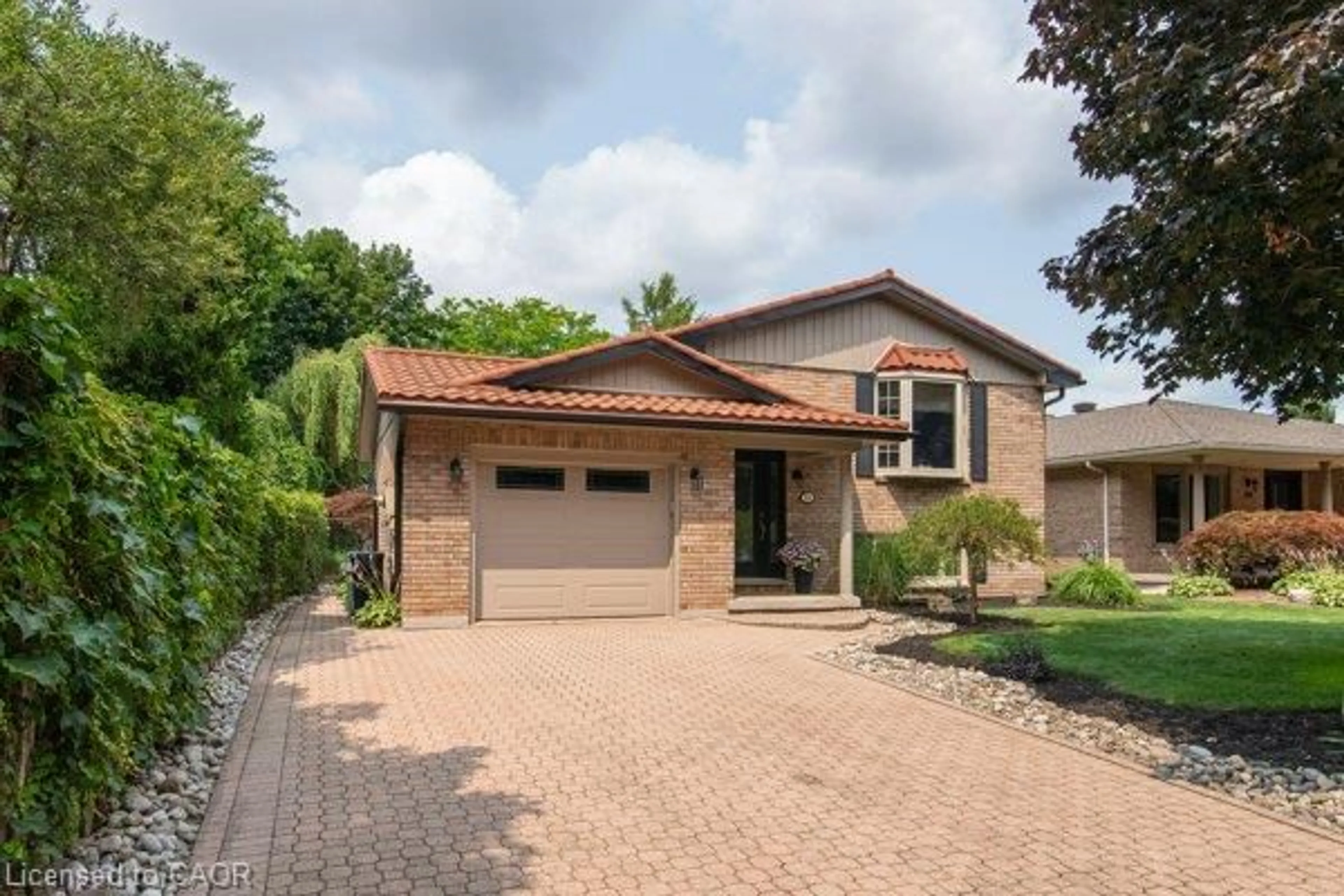 Home with brick exterior material, street for 154 Ambleside Crt, Waterloo Ontario N2K 3E3
