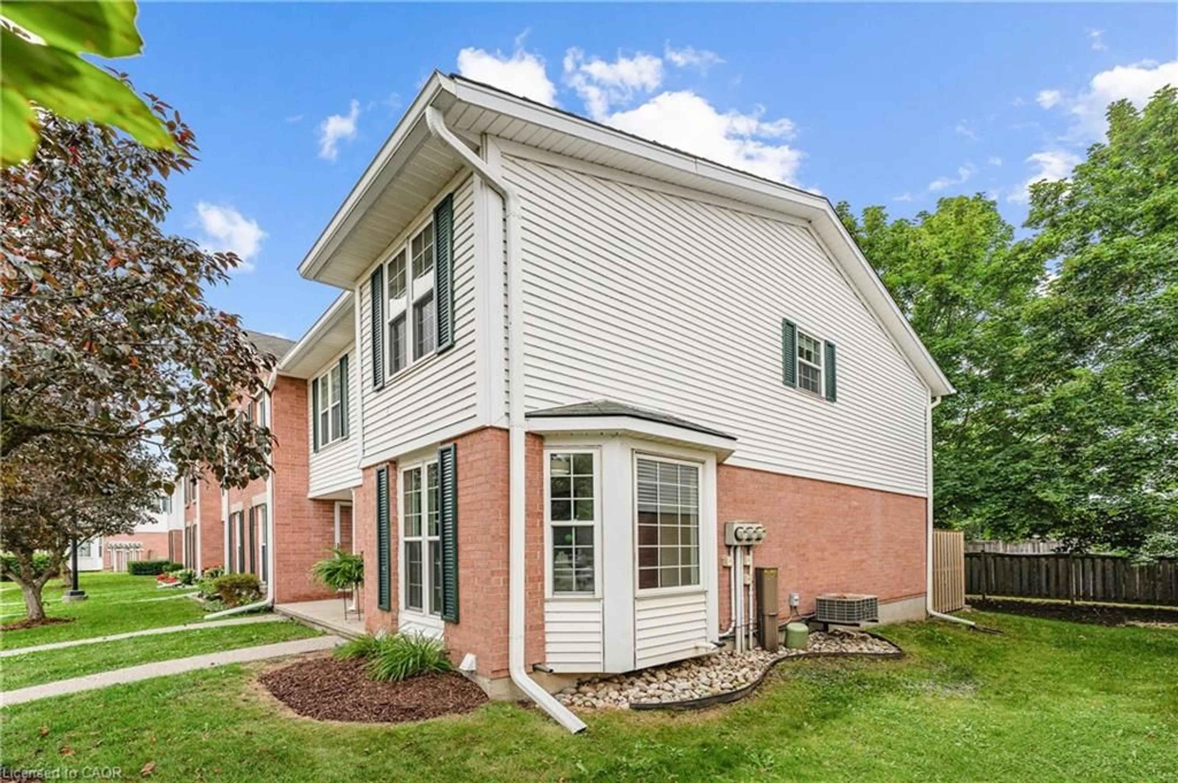 Home with brick exterior material, unknown for 465 Woolwich St #7, Waterloo Ontario N2K 3S4