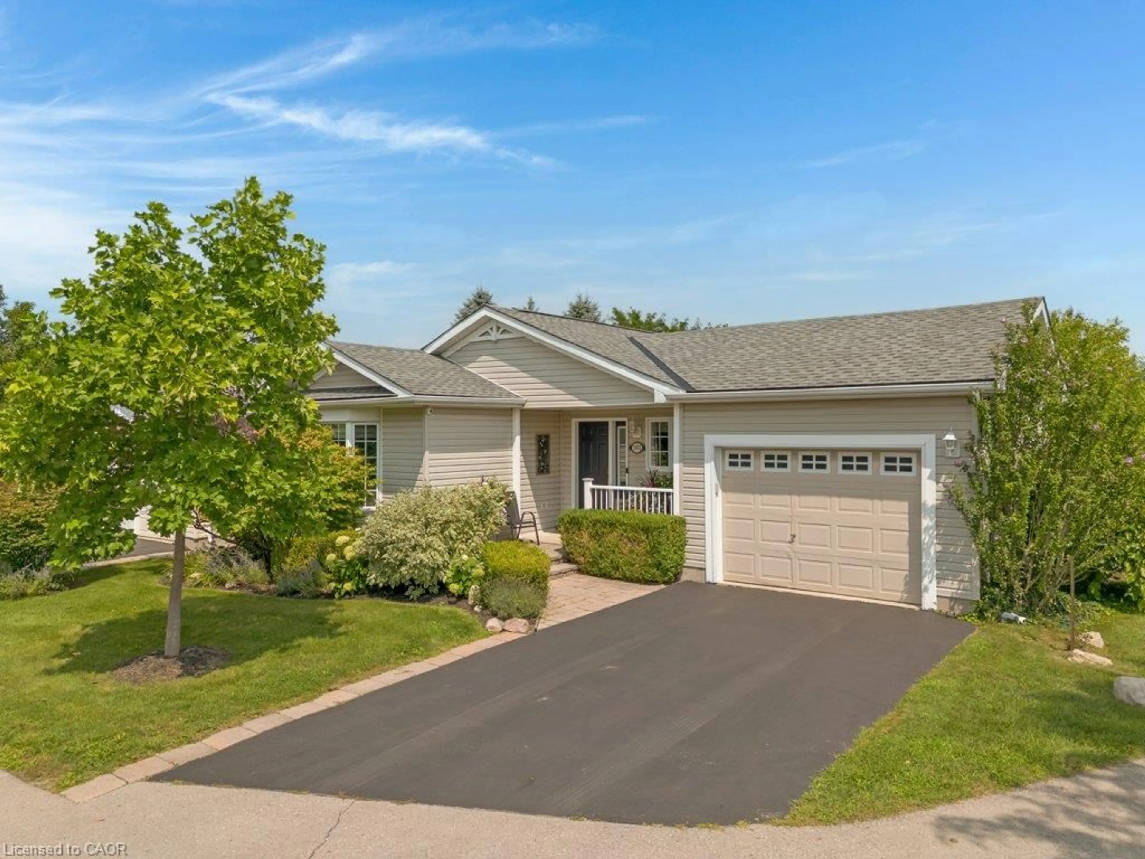 Home with vinyl exterior material, street for 103 Dunadry Lane, Freelton Ontario L0R 1K0