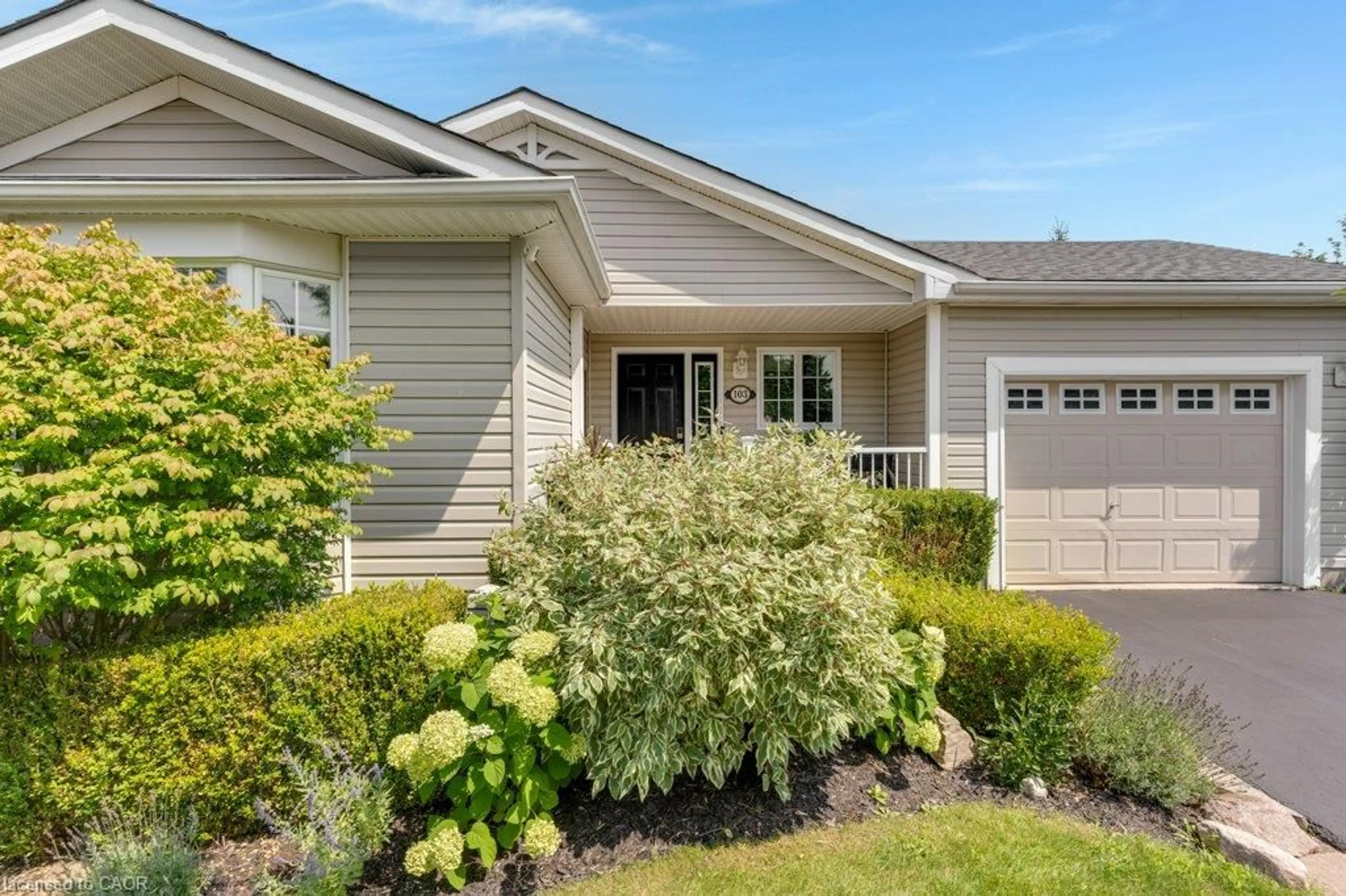 Home with vinyl exterior material, street for 103 Dunadry Lane, Freelton Ontario L0R 1K0