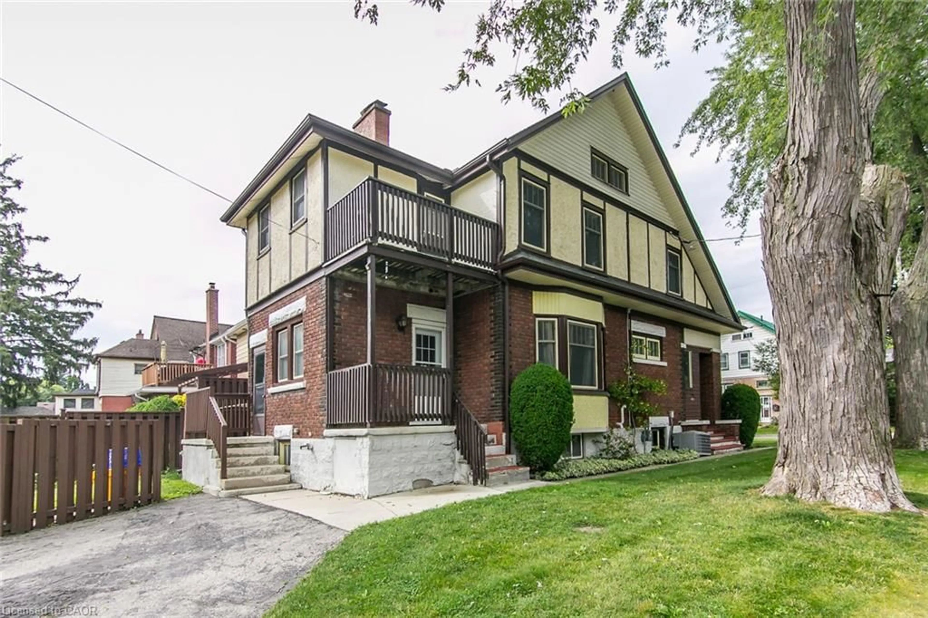 Home with brick exterior material, street for 64 Simeon St, Kitchener Ontario N2H 1S5