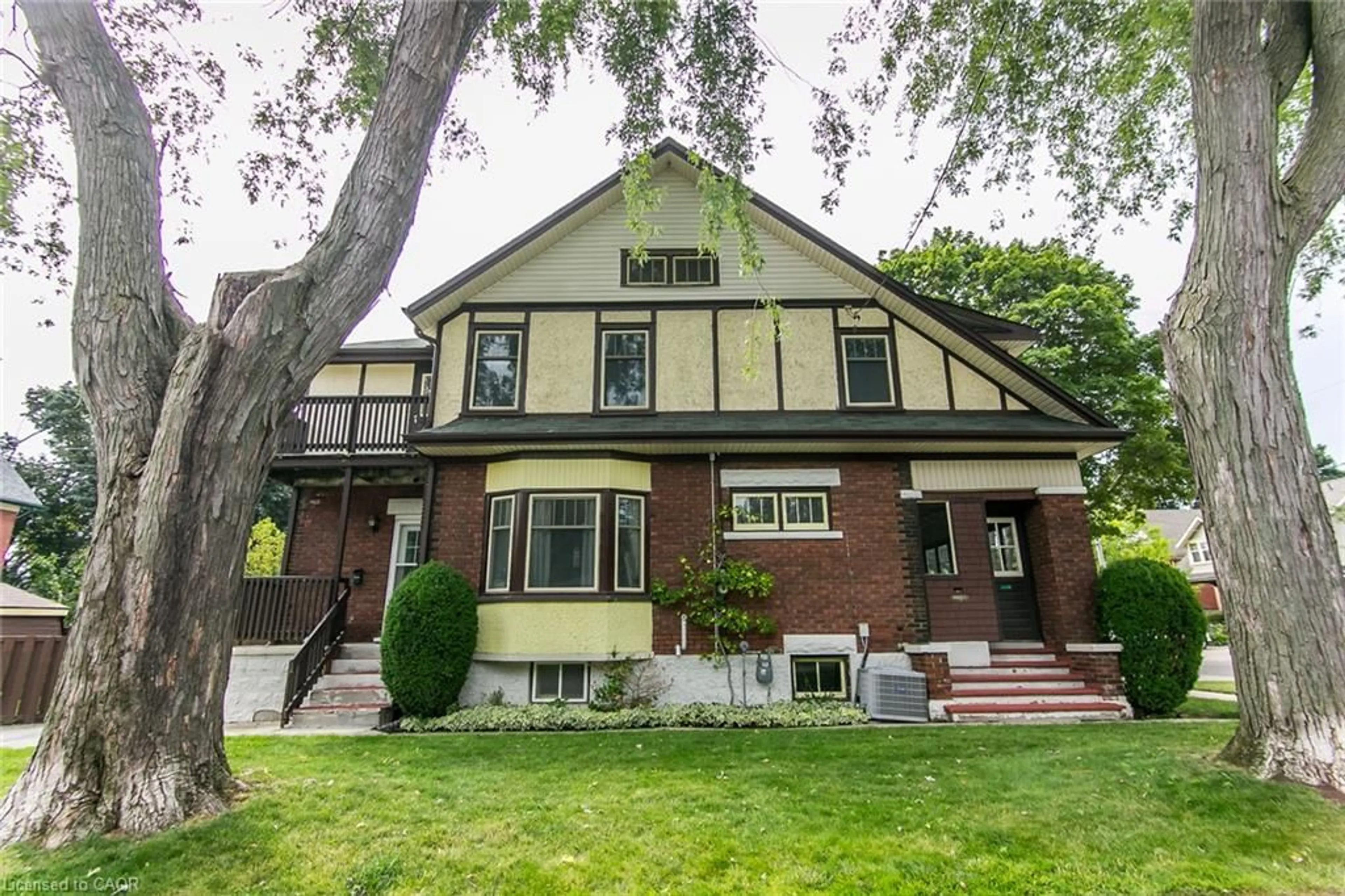 Home with brick exterior material, street for 64 Simeon St, Kitchener Ontario N2H 1S5