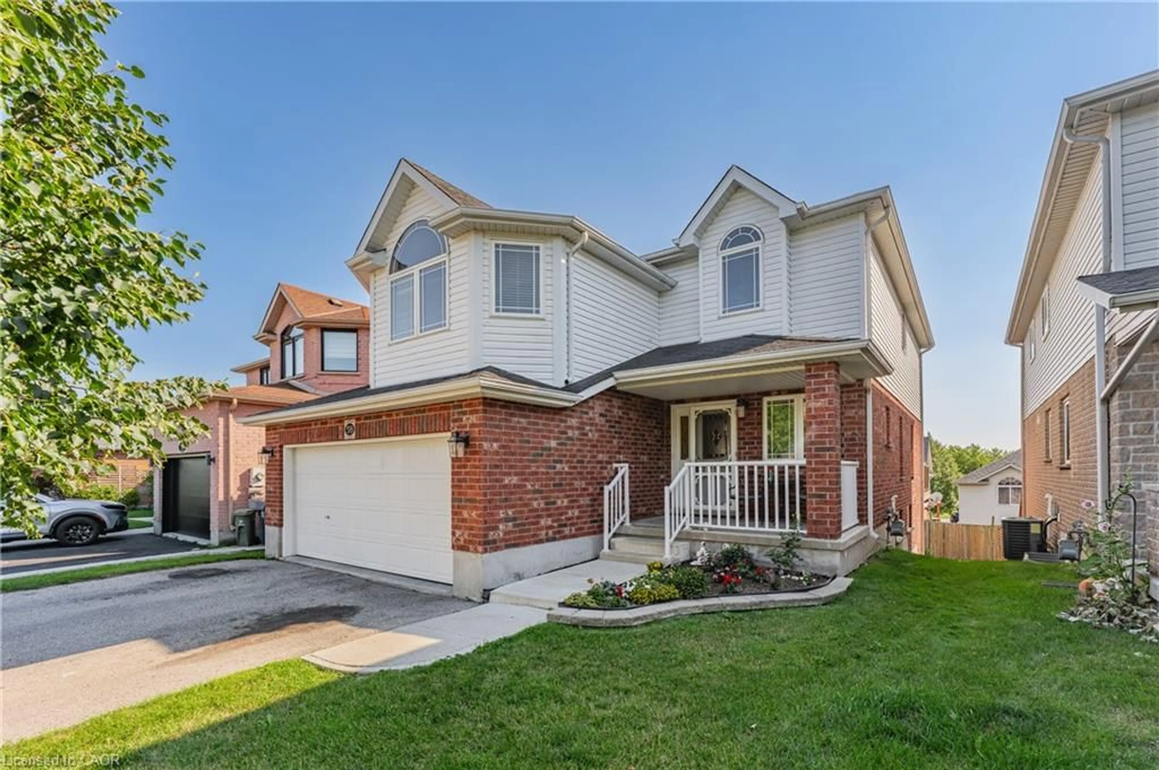 Home with brick exterior material, street for 58 Washburn Dr, Guelph Ontario N1E 0B2