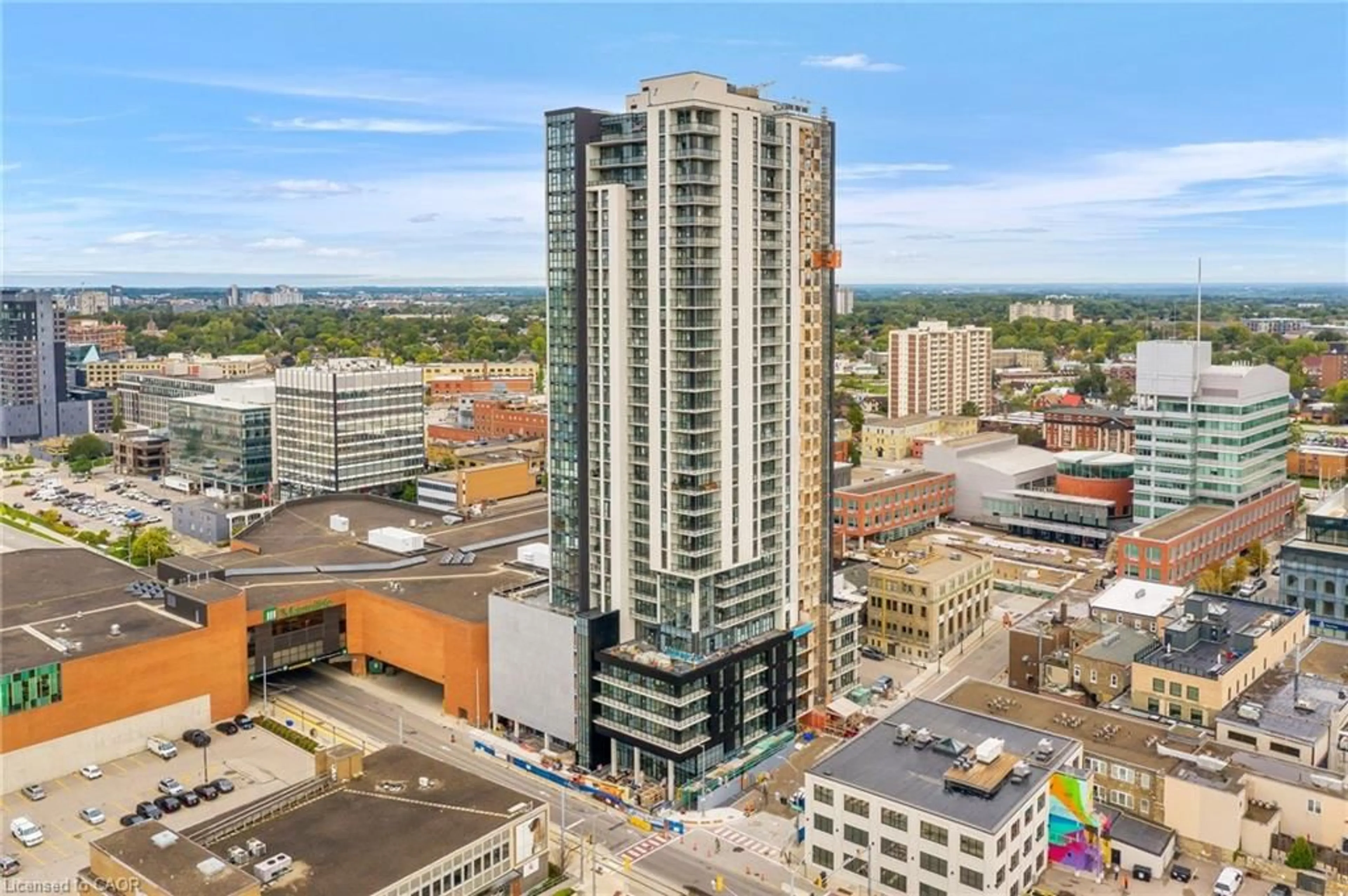 A pic from outside/outdoor area/front of a property/back of a property/a pic from drone, city buildings view from balcony for 60 Charles St #705, Kitchener Ontario N2G 0C9