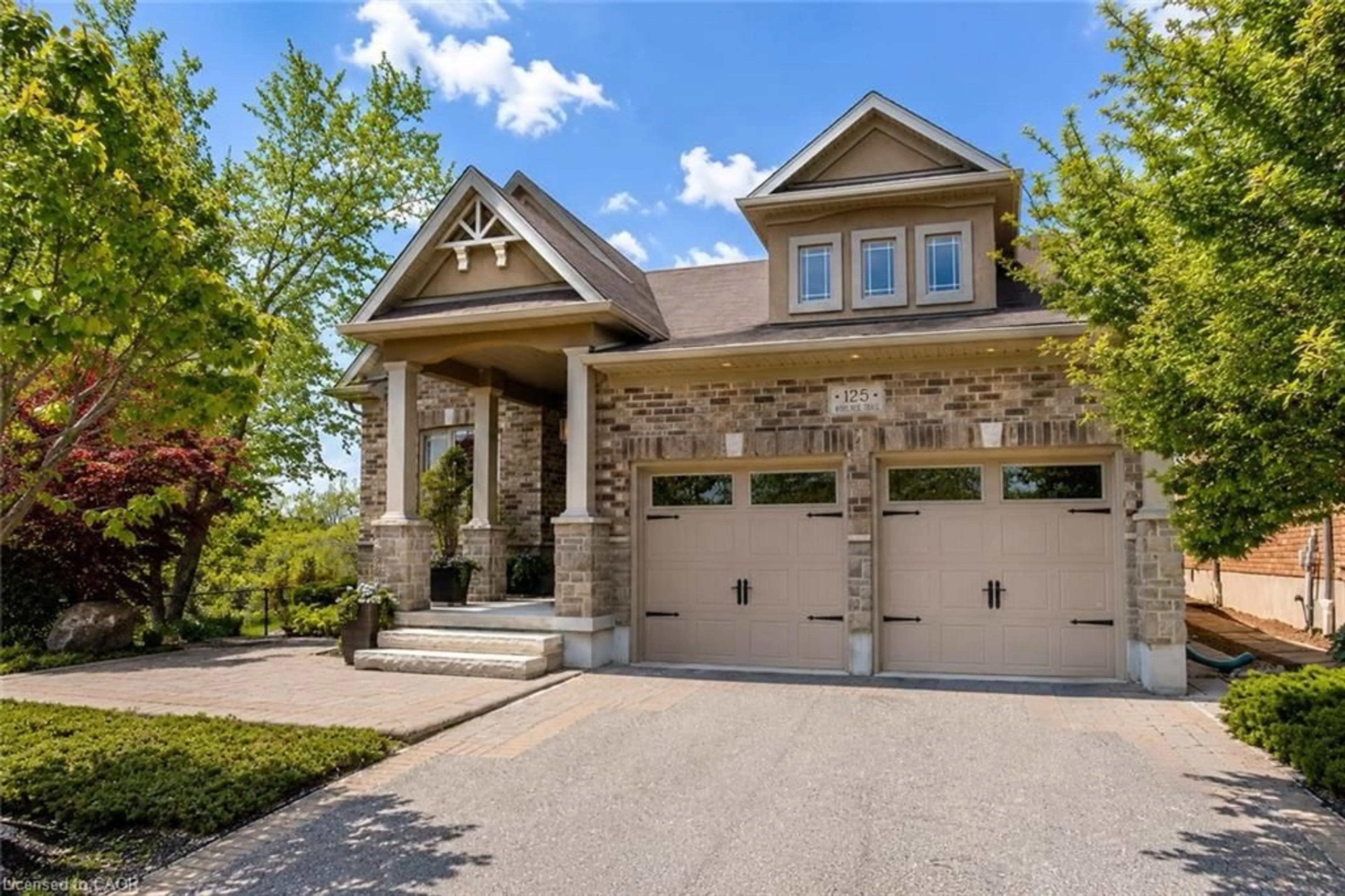 Home with brick exterior material, street for 125 Woolner Trail, Kitchener Ontario N2A 4N3