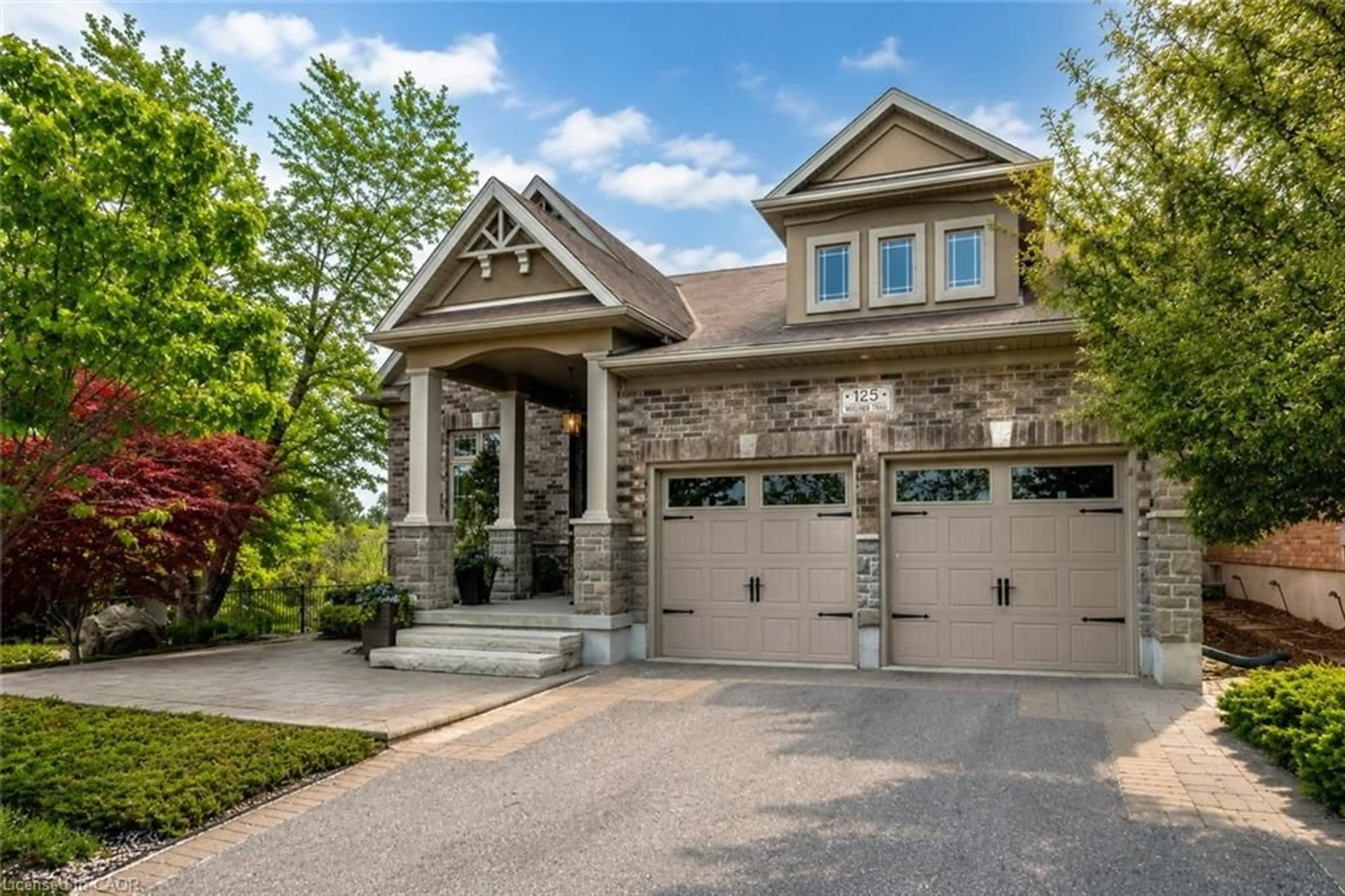 Home with brick exterior material, street for 125 Woolner Trail, Kitchener Ontario N2A 4N3