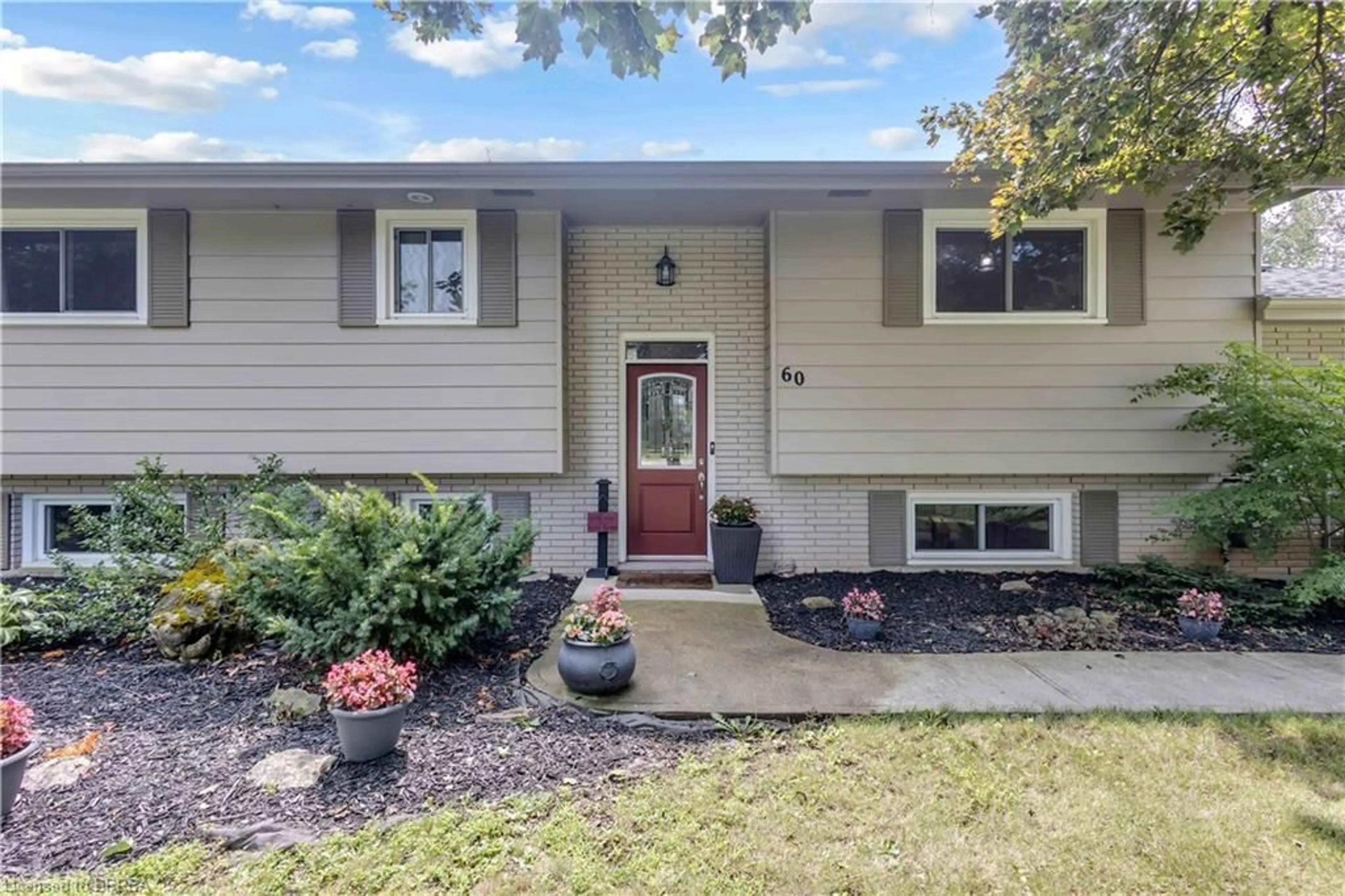 Home with vinyl exterior material, street for 60 Brown Ave, Burford Ontario N0E 1A0