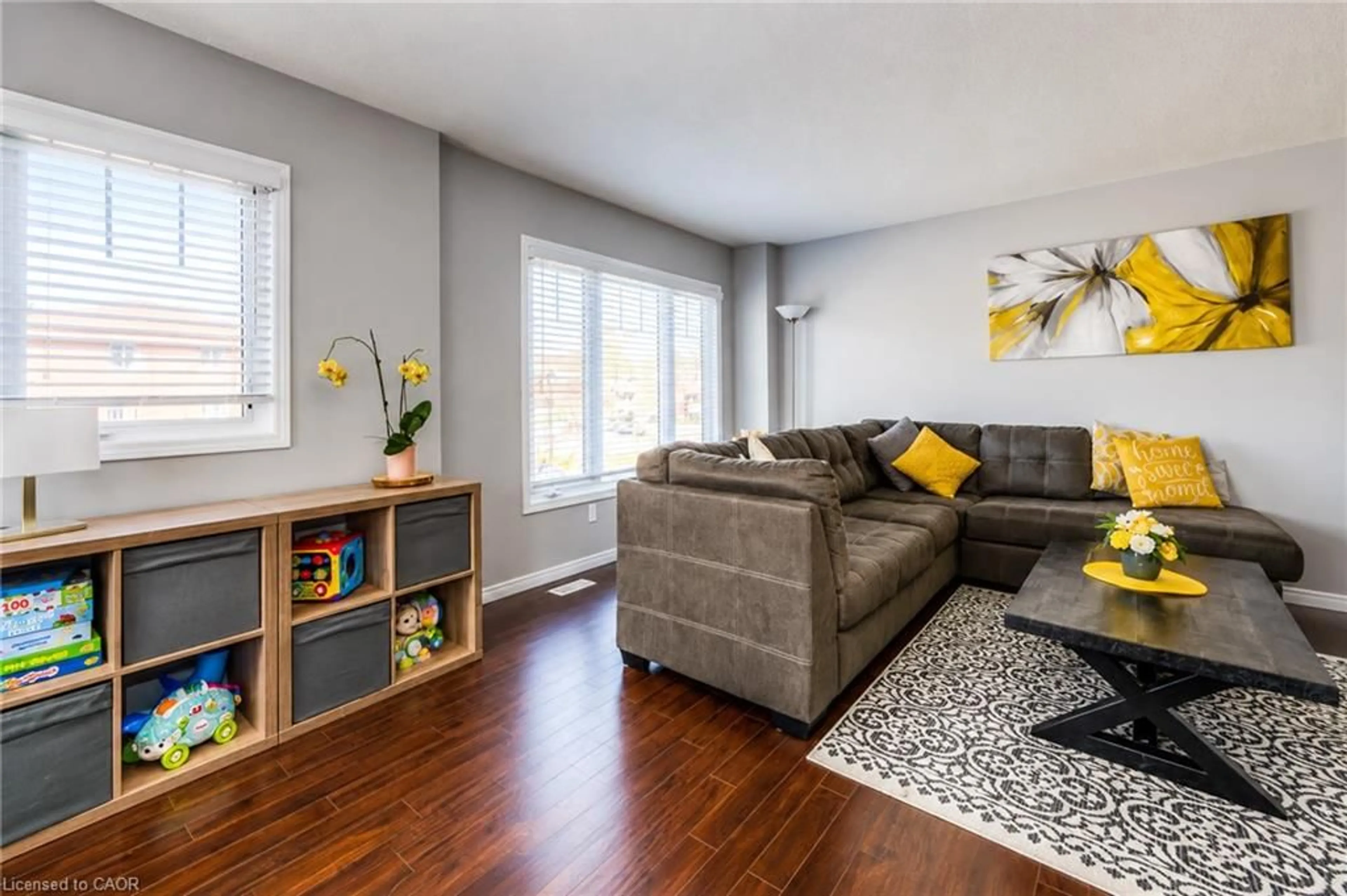 Living room with furniture, wood/laminate floor for 750 Lawrence St #86, Cambridge Ontario N3H 4A9