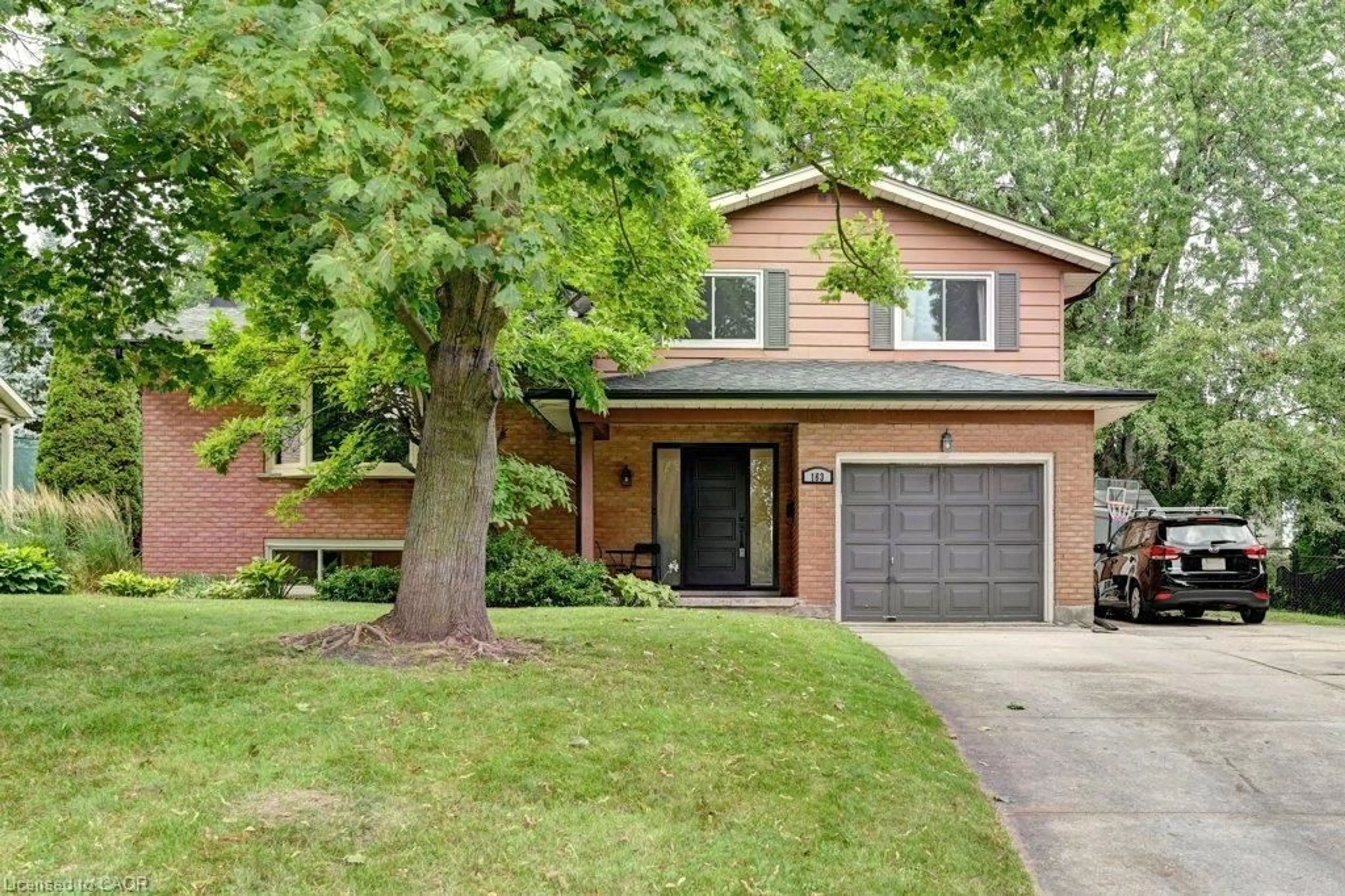 Home with brick exterior material, street for 163 Chelford Cres, Waterloo Ontario N2J 3T7