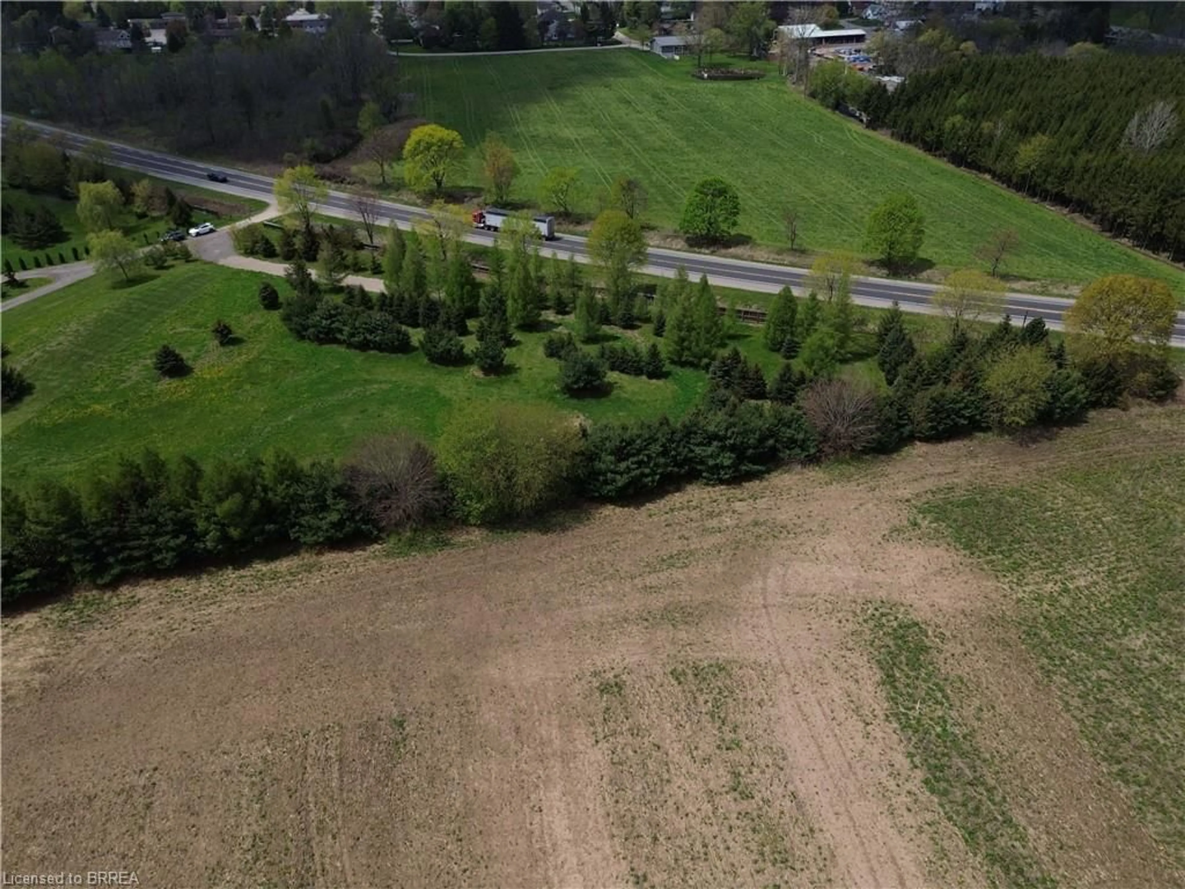 A pic from outside/outdoor area/front of a property/back of a property/a pic from drone, forest/trees view for 38A Highway 24, Scotland Ontario N0E 1R0