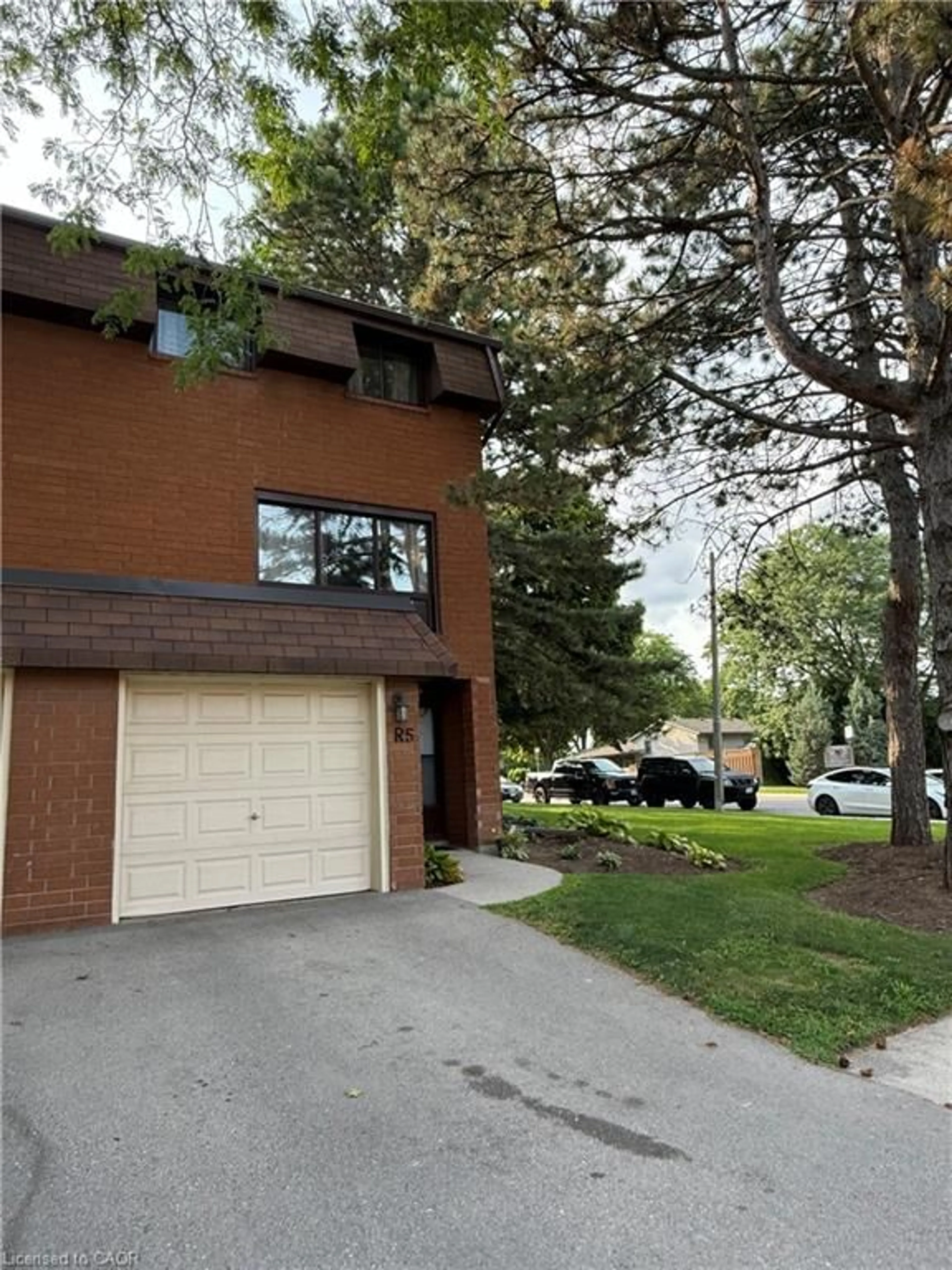 Home with brick exterior material, street for 444 Stone Church Rd #R5, Hamilton Ontario L9B 1R1