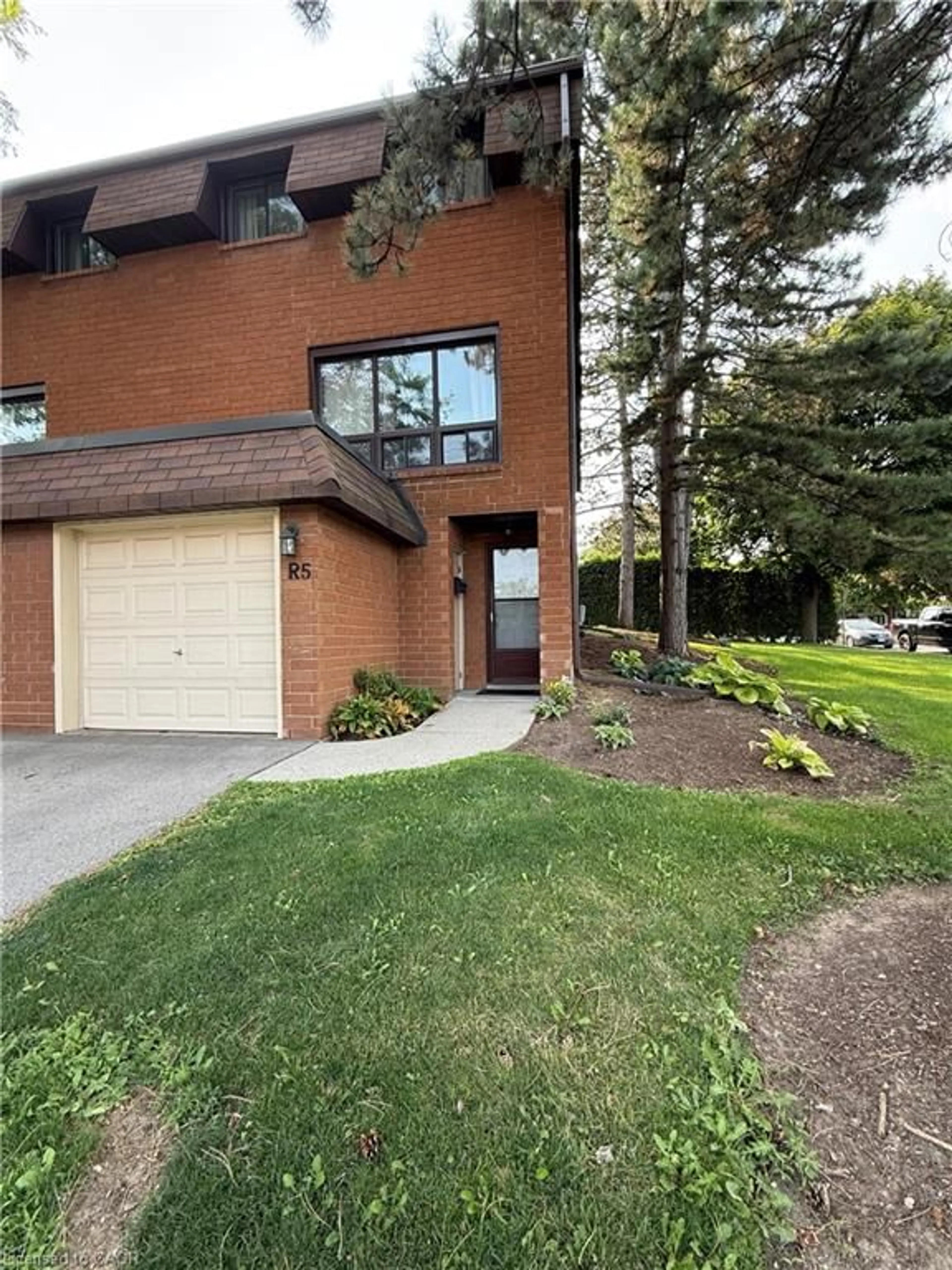 Home with brick exterior material, street for 444 Stone Church Rd #R5, Hamilton Ontario L9B 1R1