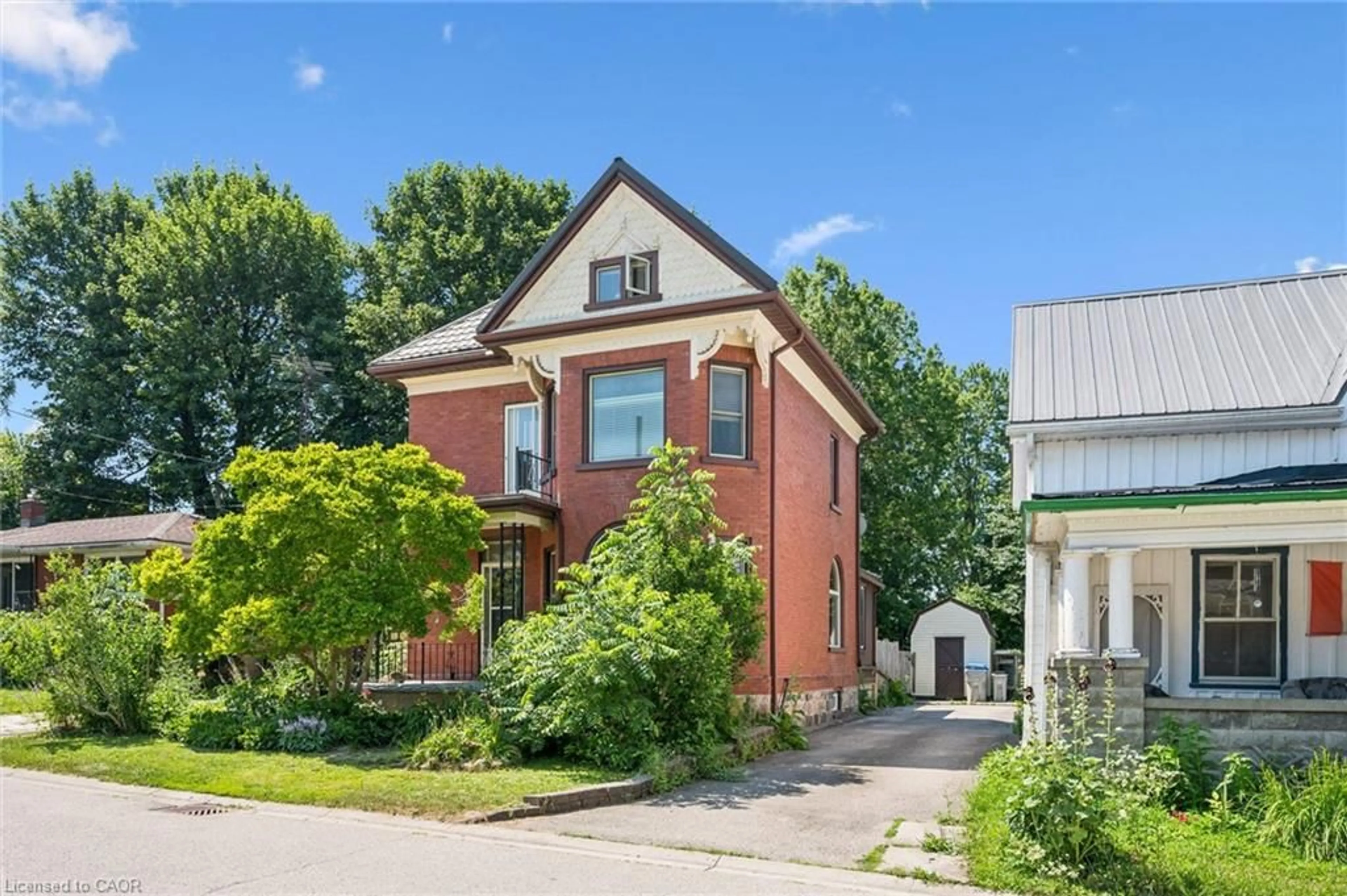 Home with brick exterior material, street for 5 West St, Milverton Ontario N0K 1M0