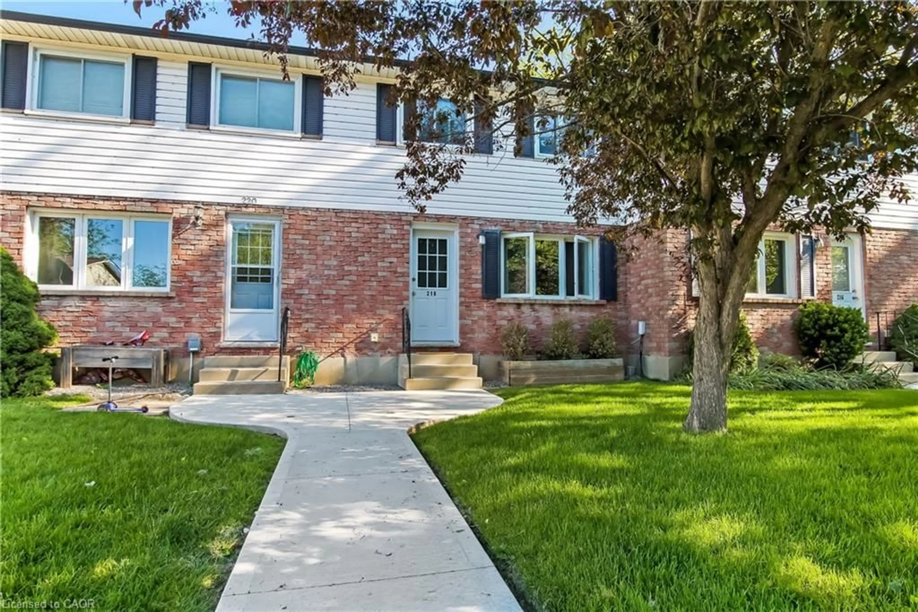 Home with brick exterior material, street for 218 Richardson Dr #26, Port Dover Ontario N0A 1N4