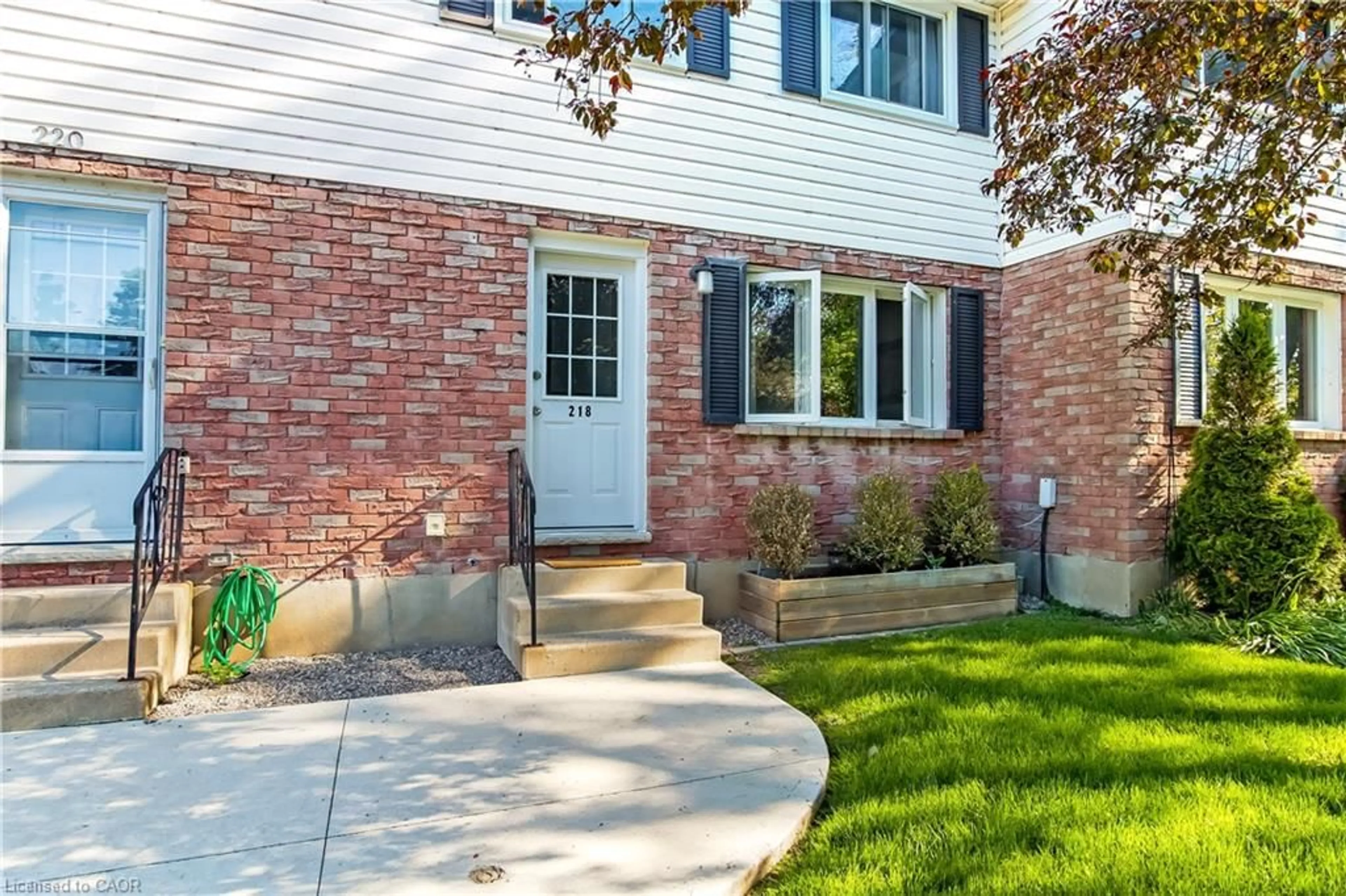 Home with brick exterior material, street for 218 Richardson Dr #26, Port Dover Ontario N0A 1N4