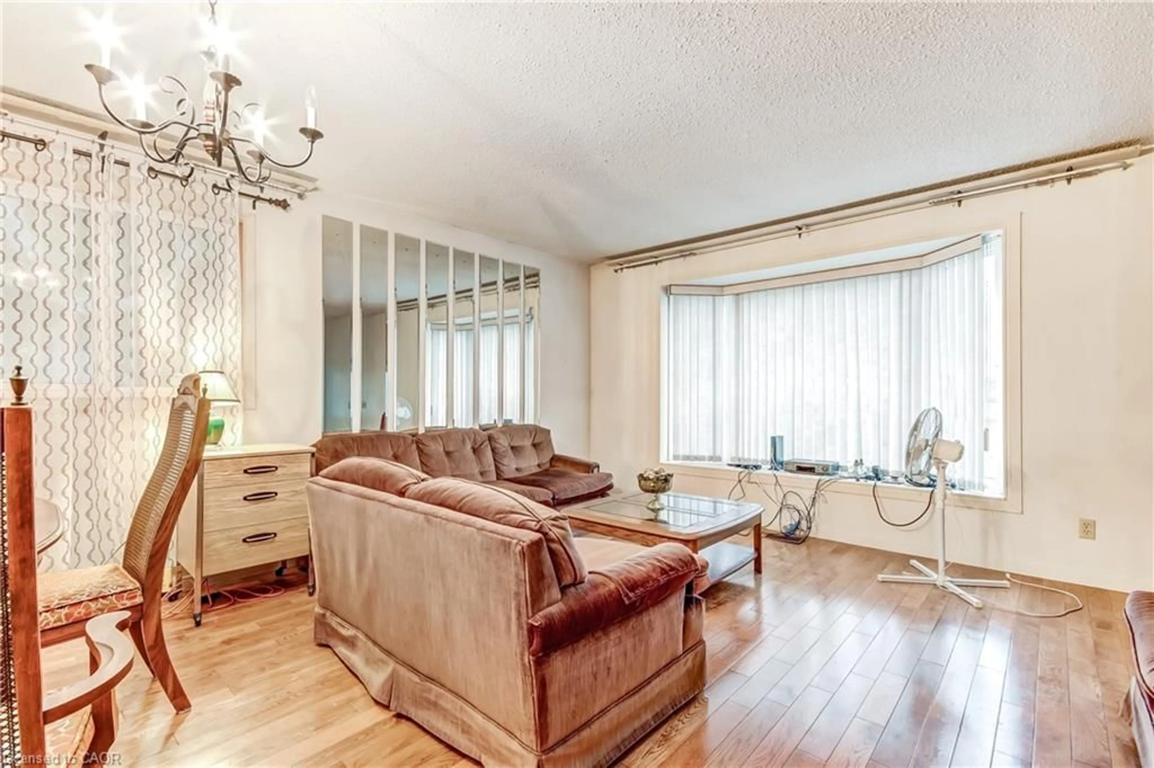 Living room with furniture, wood/laminate floor for 965 St George St, Port Dover Ontario N0A 1N4