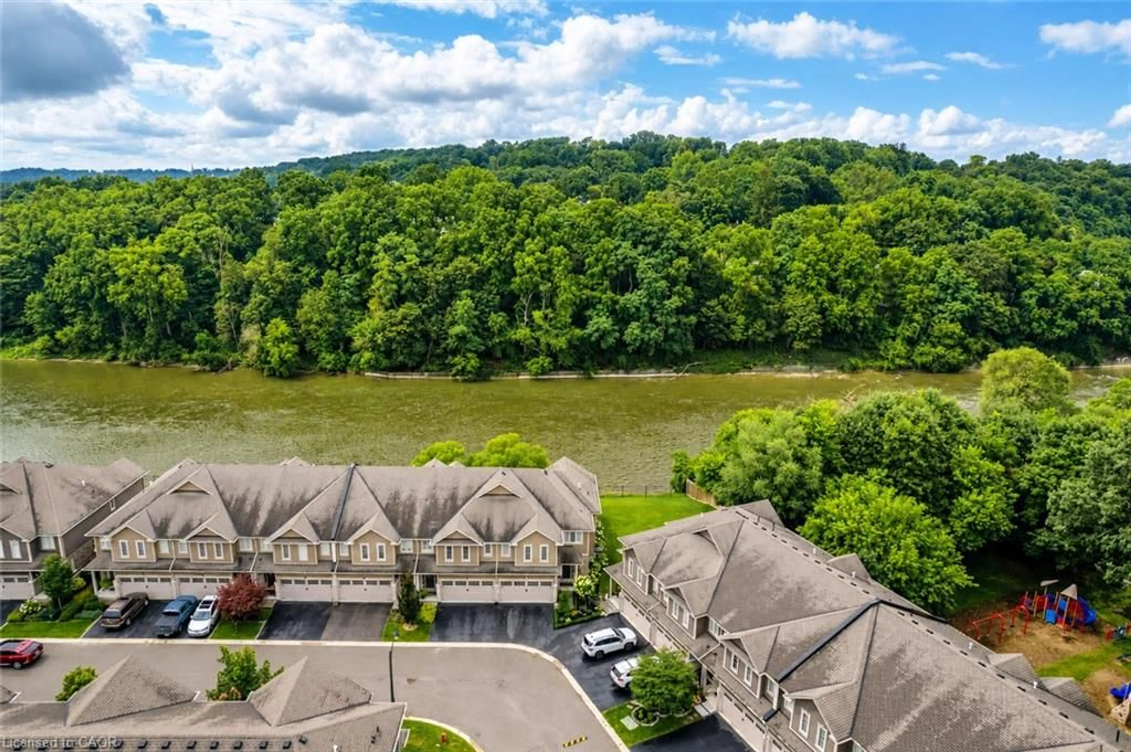 A pic from outside/outdoor area/front of a property/back of a property/a pic from drone, water/lake/river/ocean view for 80 Willow St #21, Paris Ontario N3L 2K6