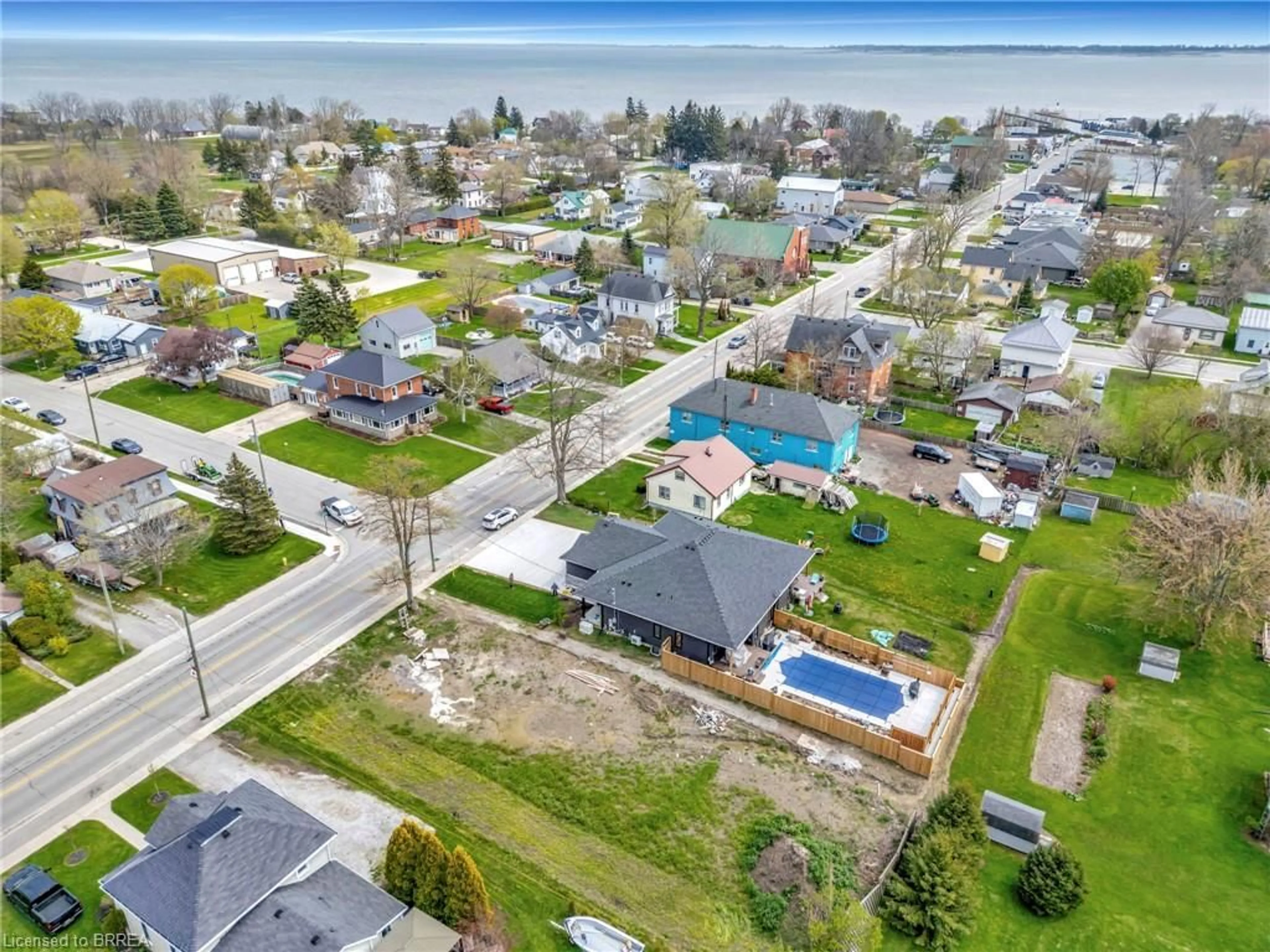 A pic from outside/outdoor area/front of a property/back of a property/a pic from drone, water/lake/river/ocean view for 1079 Bay St, Port Rowan Ontario N0E 1M0