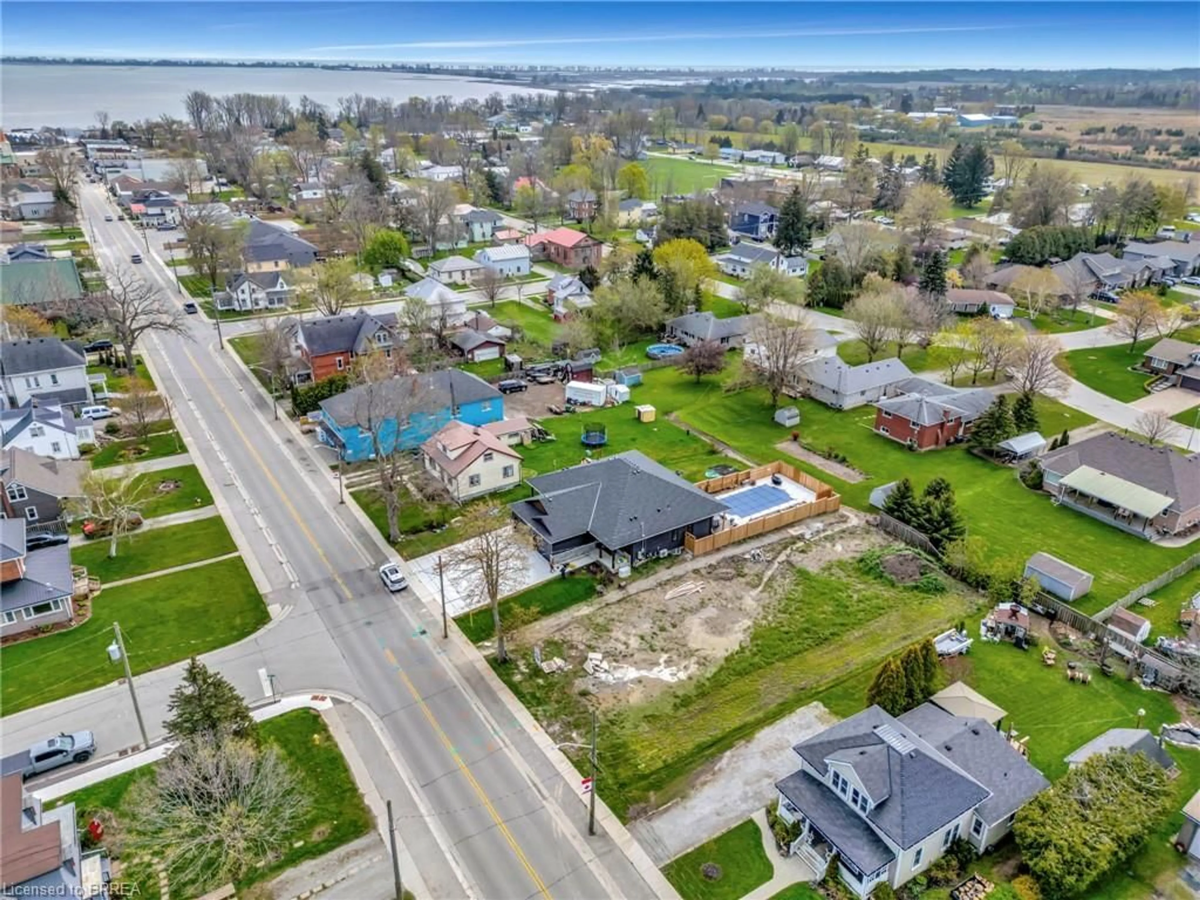 A pic from outside/outdoor area/front of a property/back of a property/a pic from drone, water/lake/river/ocean view for 1079 Bay St, Port Rowan Ontario N0E 1M0
