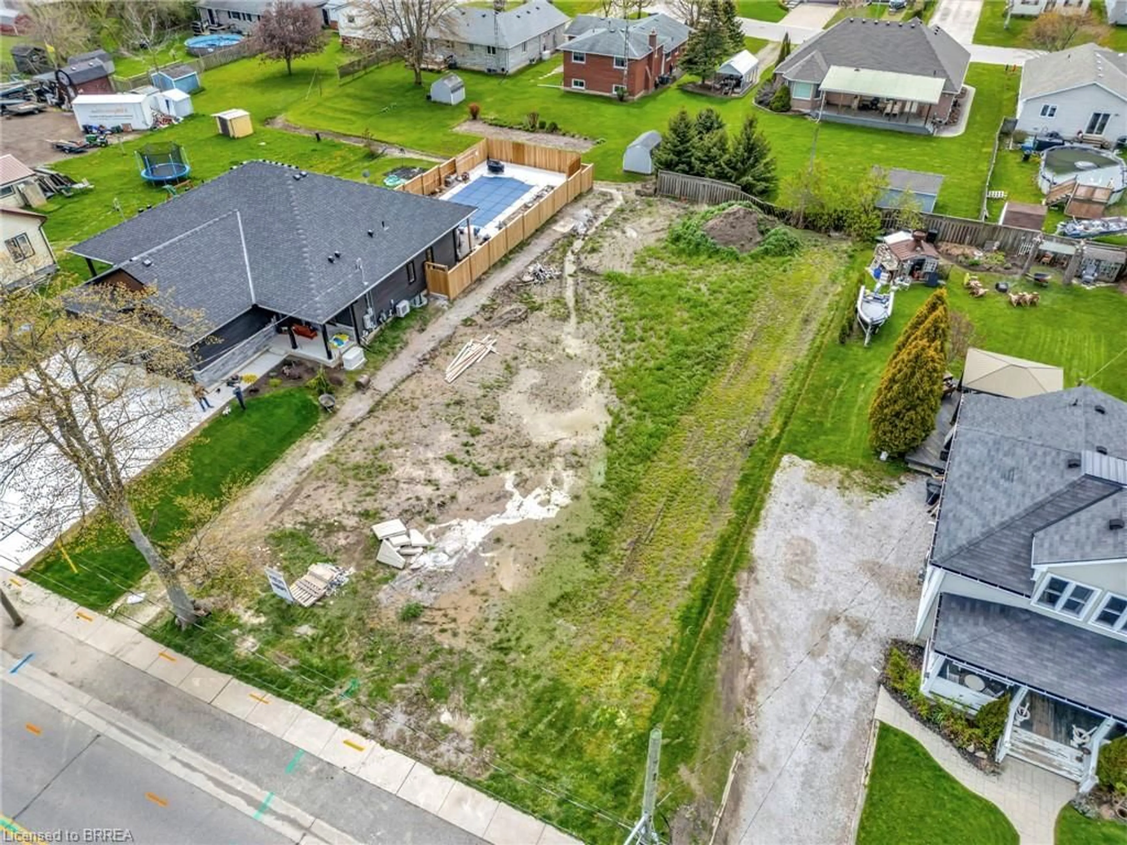 A pic from outside/outdoor area/front of a property/back of a property/a pic from drone, street for 1079 Bay St, Port Rowan Ontario N0E 1M0