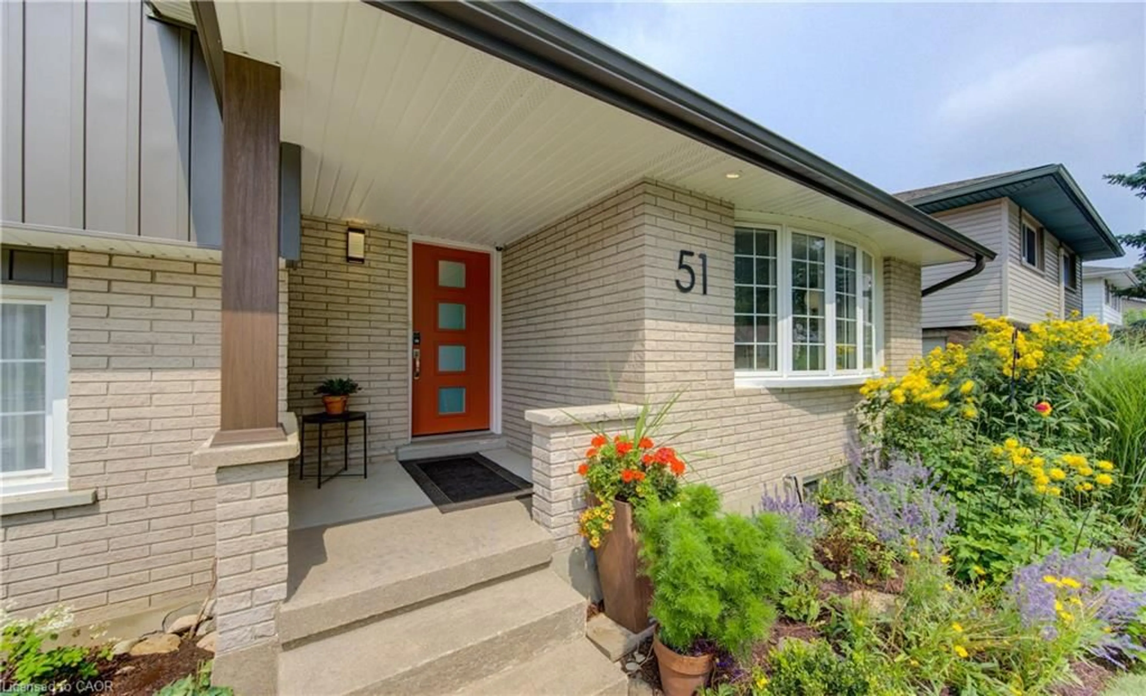 Home with brick exterior material, street for 51 Charlotte Cres, Kitchener Ontario N2B 2K2