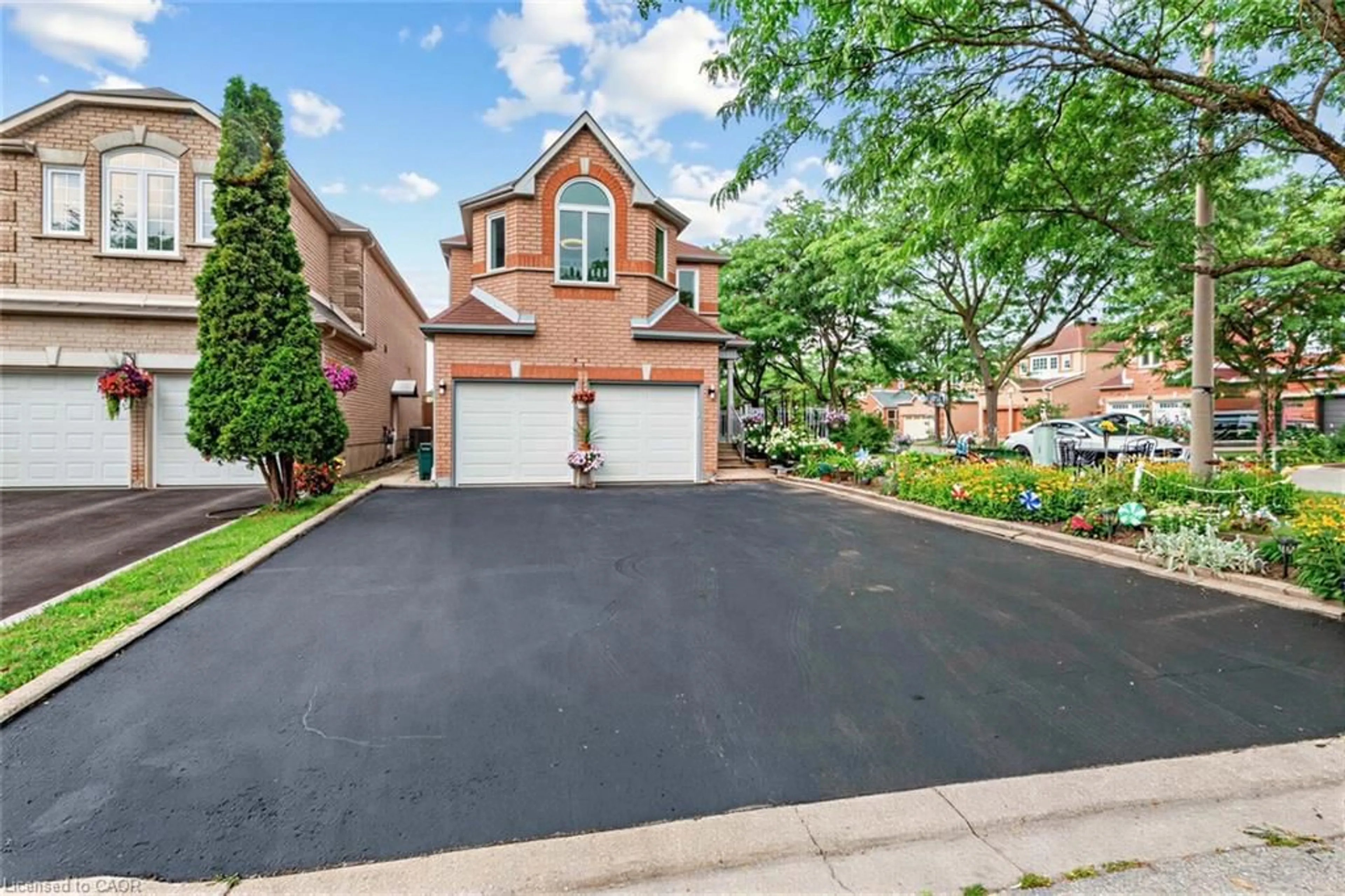 Home with brick exterior material, street for 42 Stanley Lane, Markham Ontario L3S 4E3
