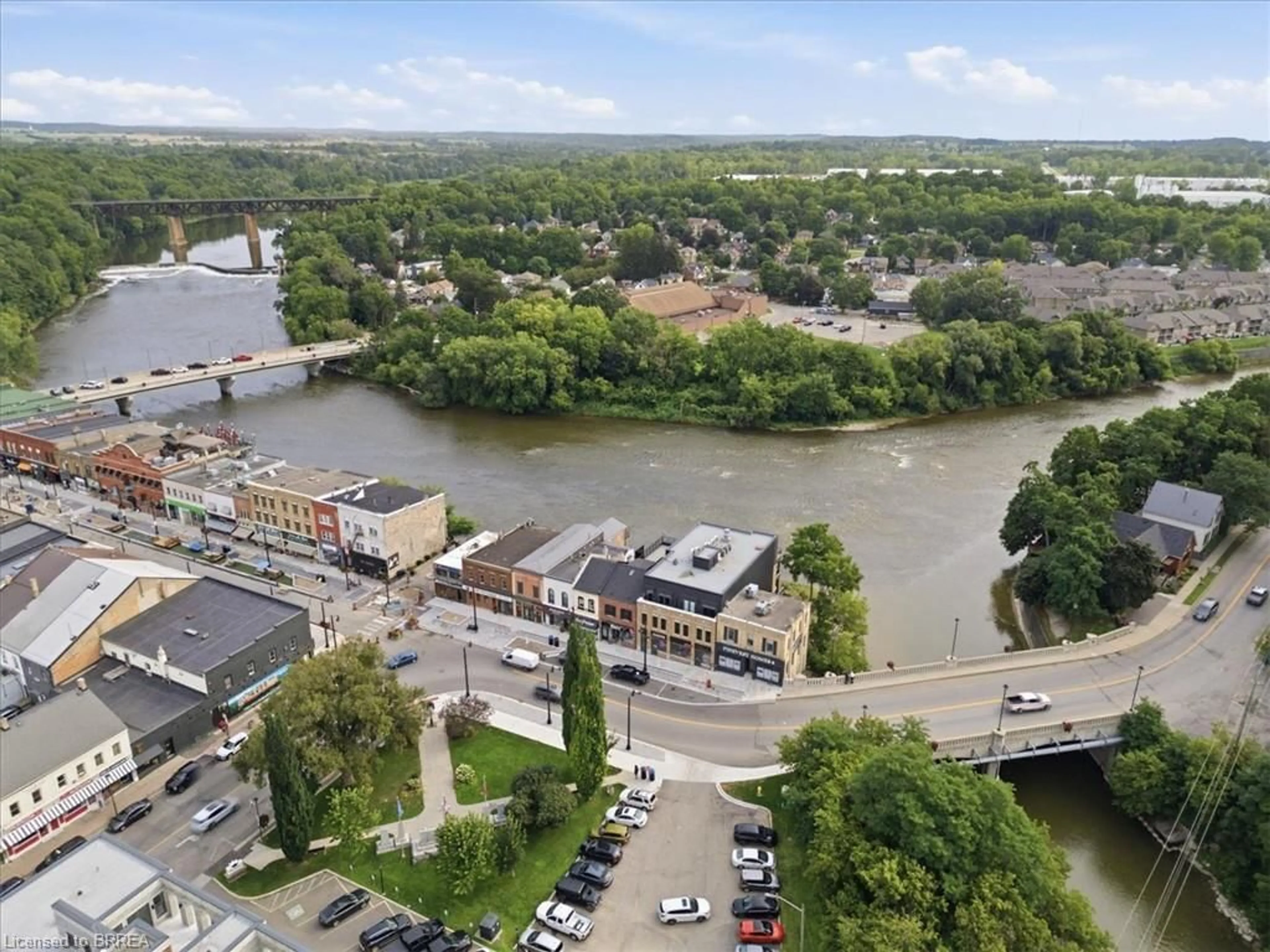 A pic from outside/outdoor area/front of a property/back of a property/a pic from drone, water/lake/river/ocean view for 7 Grand River St #204, Paris Ontario N3L 2L9