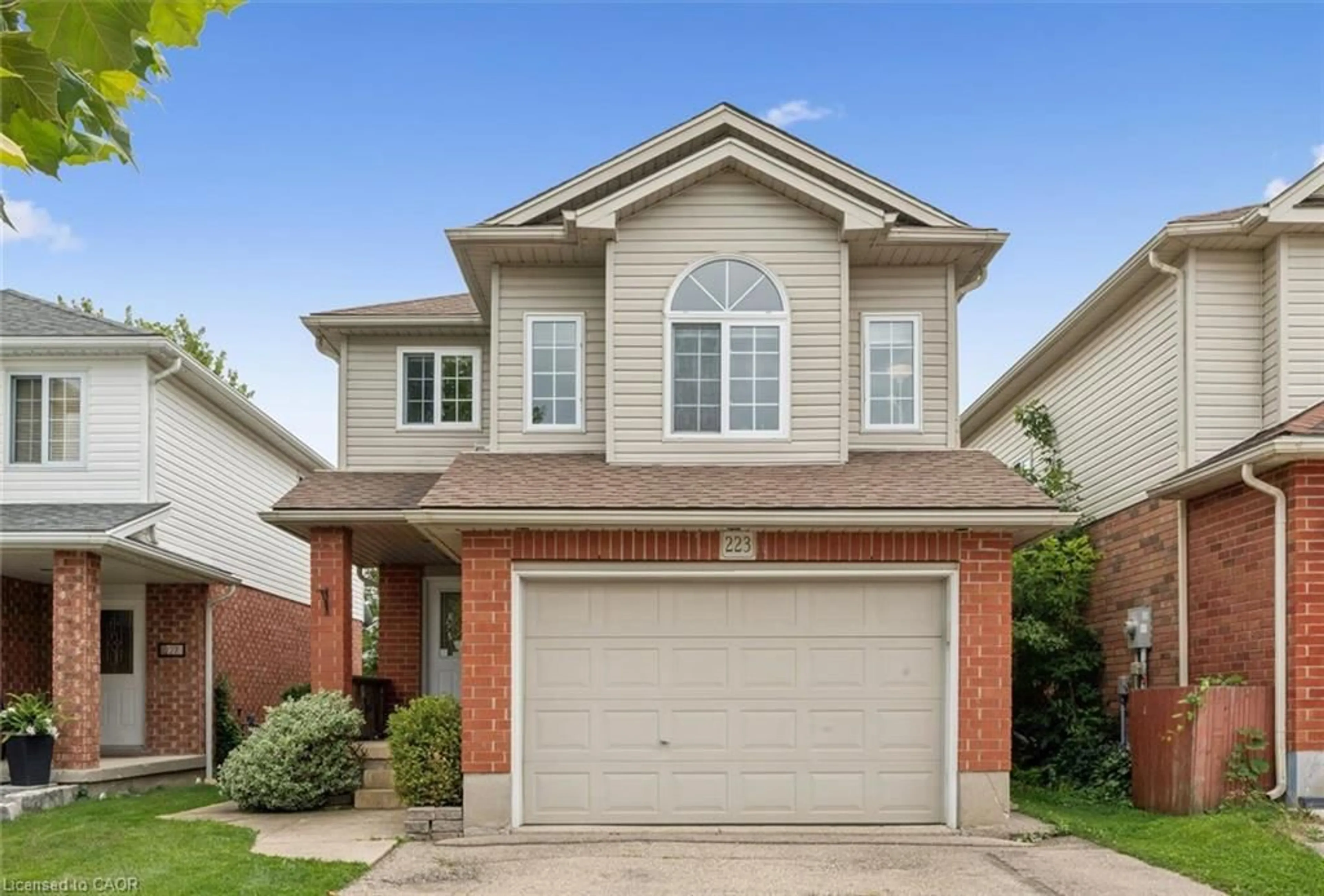Home with brick exterior material, street for 223 Hollyridge Cres, Kitchener Ontario N2N 3N3