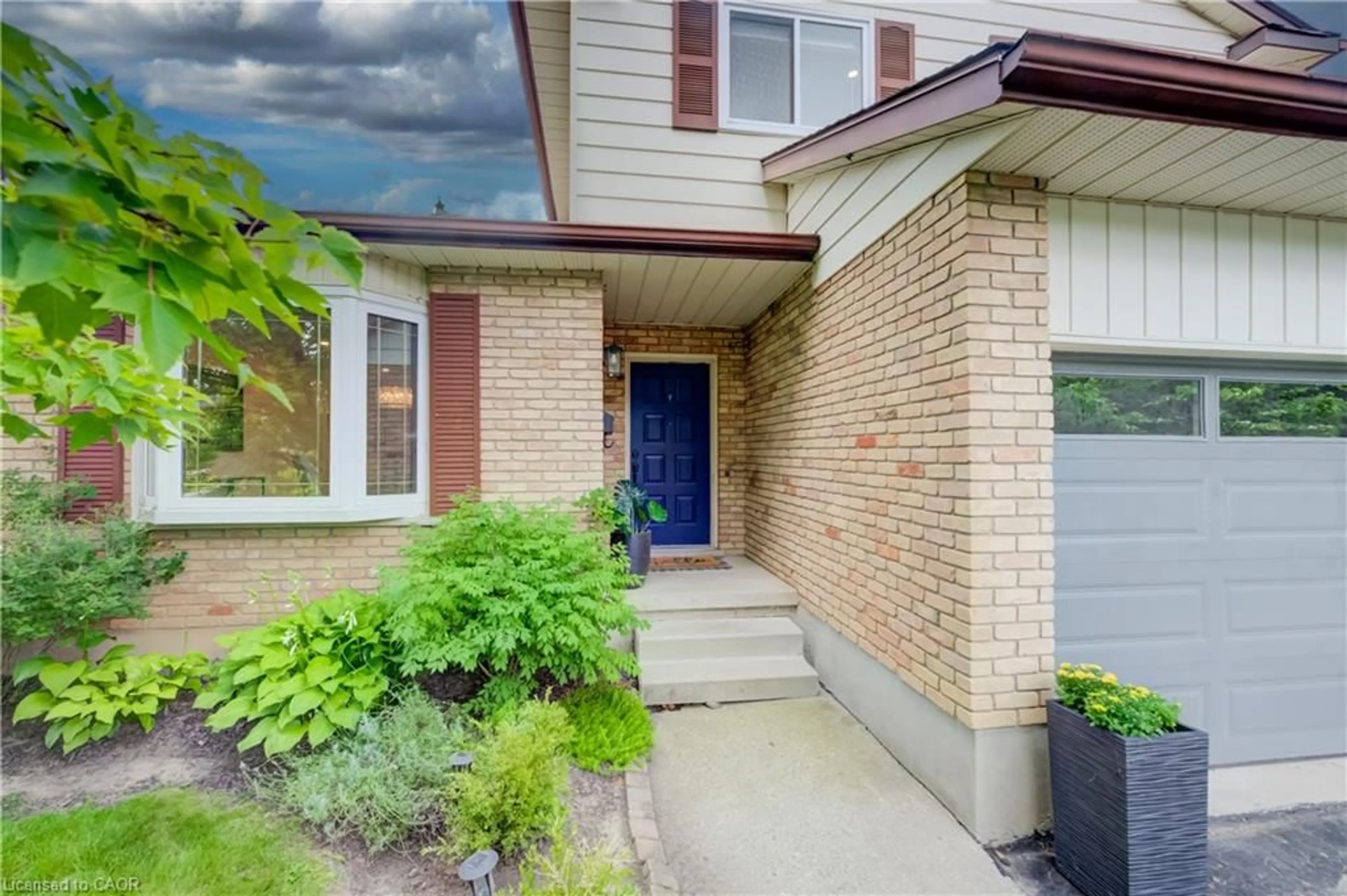 Home with brick exterior material, street for 83 Rosslinn Rd, Cambridge Ontario N1S 3K3
