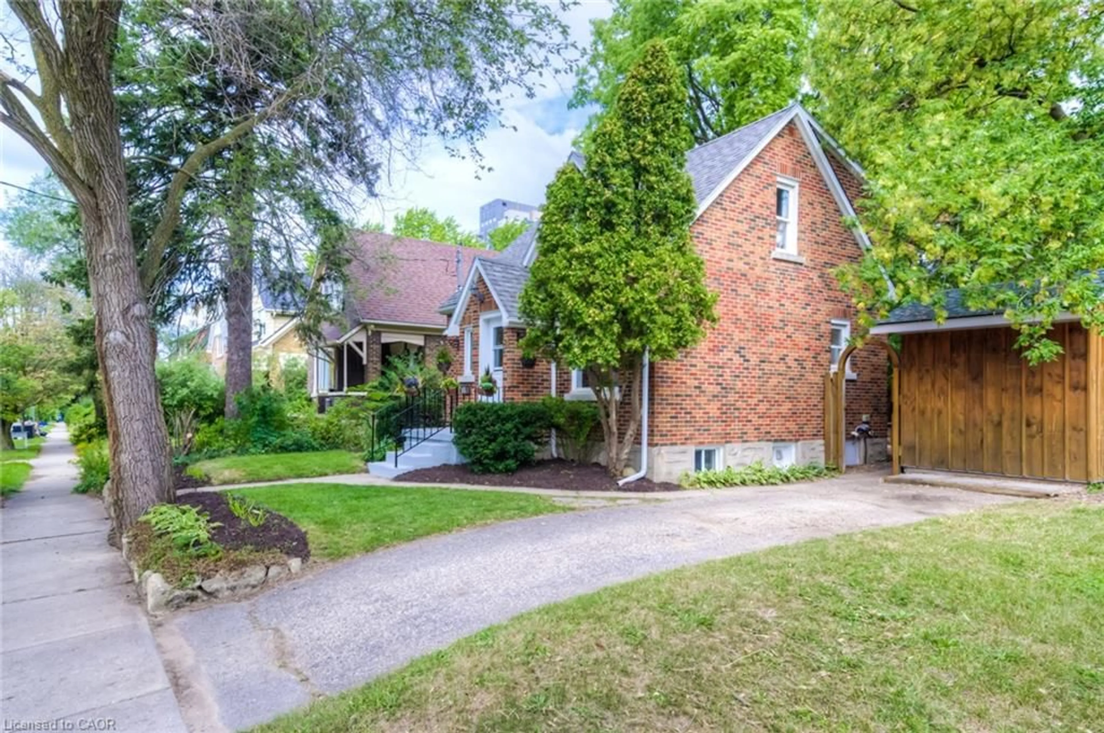 Home with brick exterior material, street for 4 Dunbar Rd, Waterloo Ontario N2L 2C7
