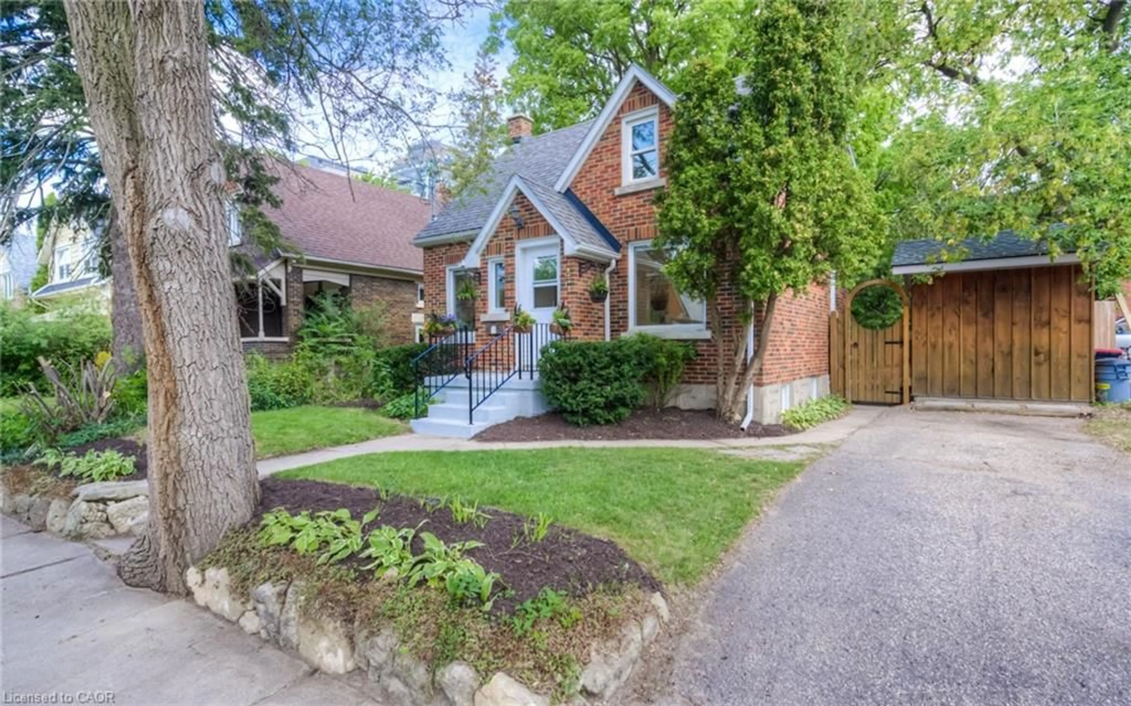 Home with brick exterior material, street for 4 Dunbar Rd, Waterloo Ontario N2L 2C7