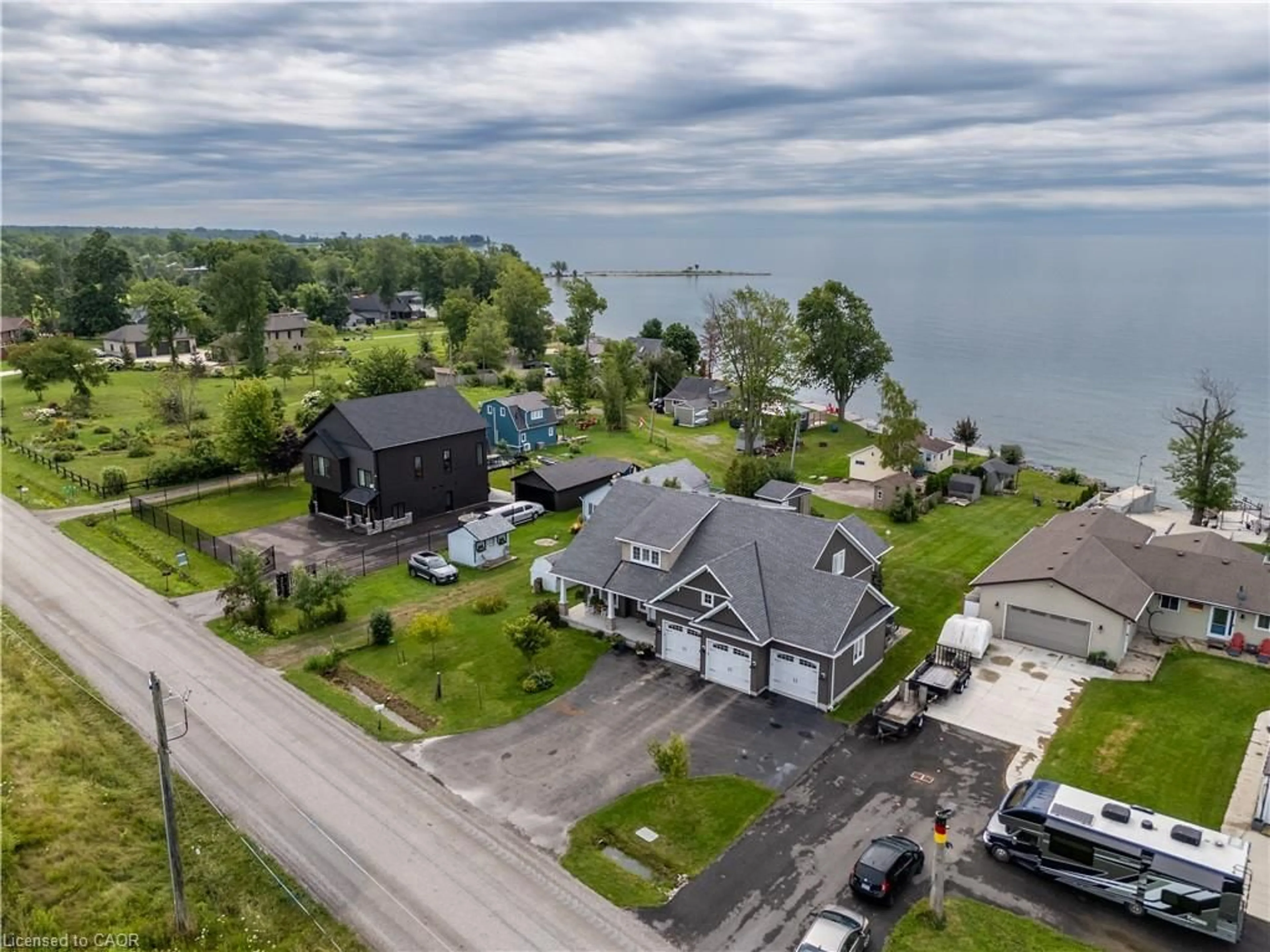 A pic from outside/outdoor area/front of a property/back of a property/a pic from drone, water/lake/river/ocean view for 3176 Lakeshore Rd, Dunnville Ontario N1A 2W8