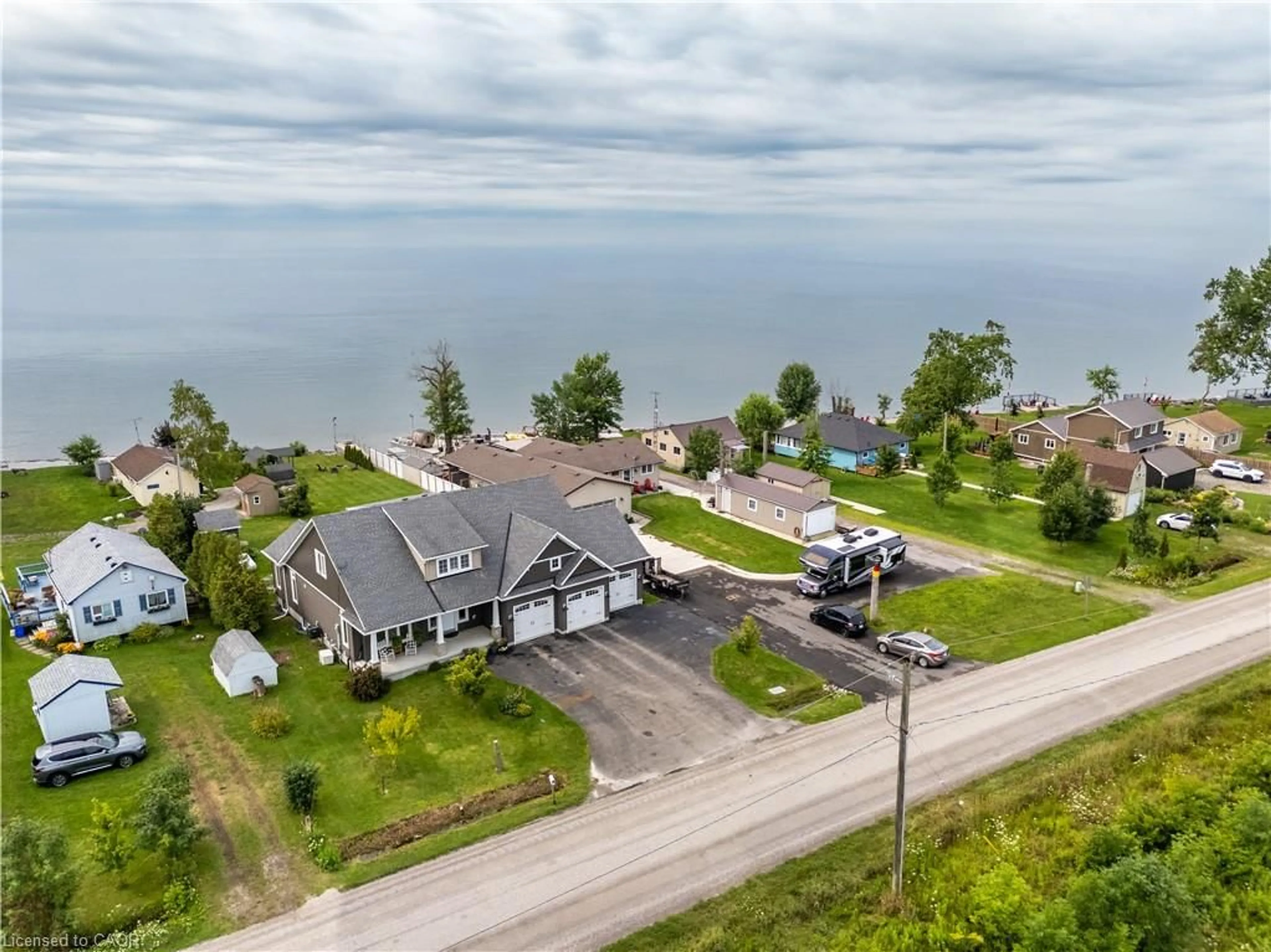 A pic from outside/outdoor area/front of a property/back of a property/a pic from drone, water/lake/river/ocean view for 3176 Lakeshore Rd, Dunnville Ontario N1A 2W8