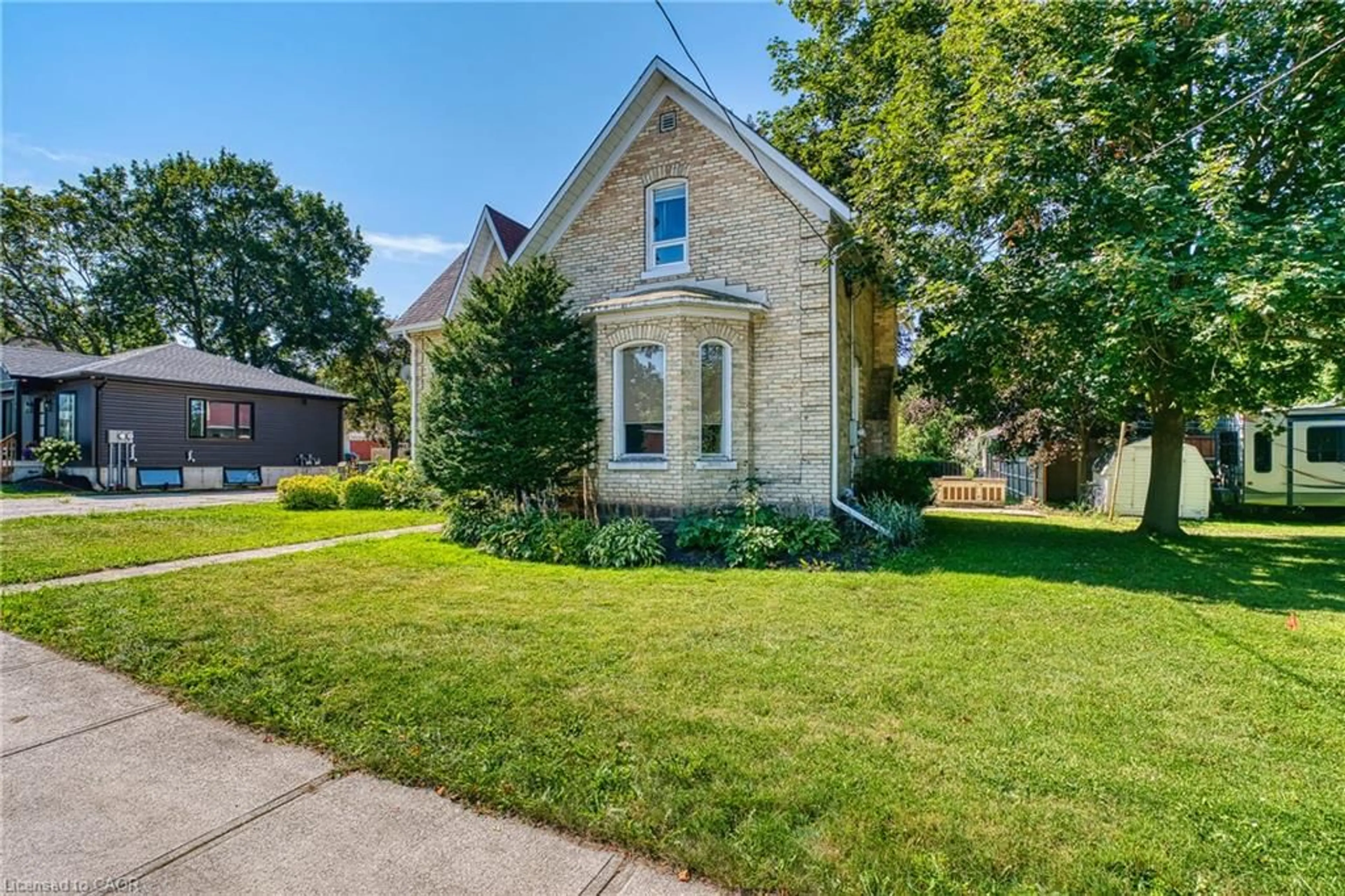 Home with brick exterior material, street for 34 Queen St, Brussels Ontario N0G 1H0