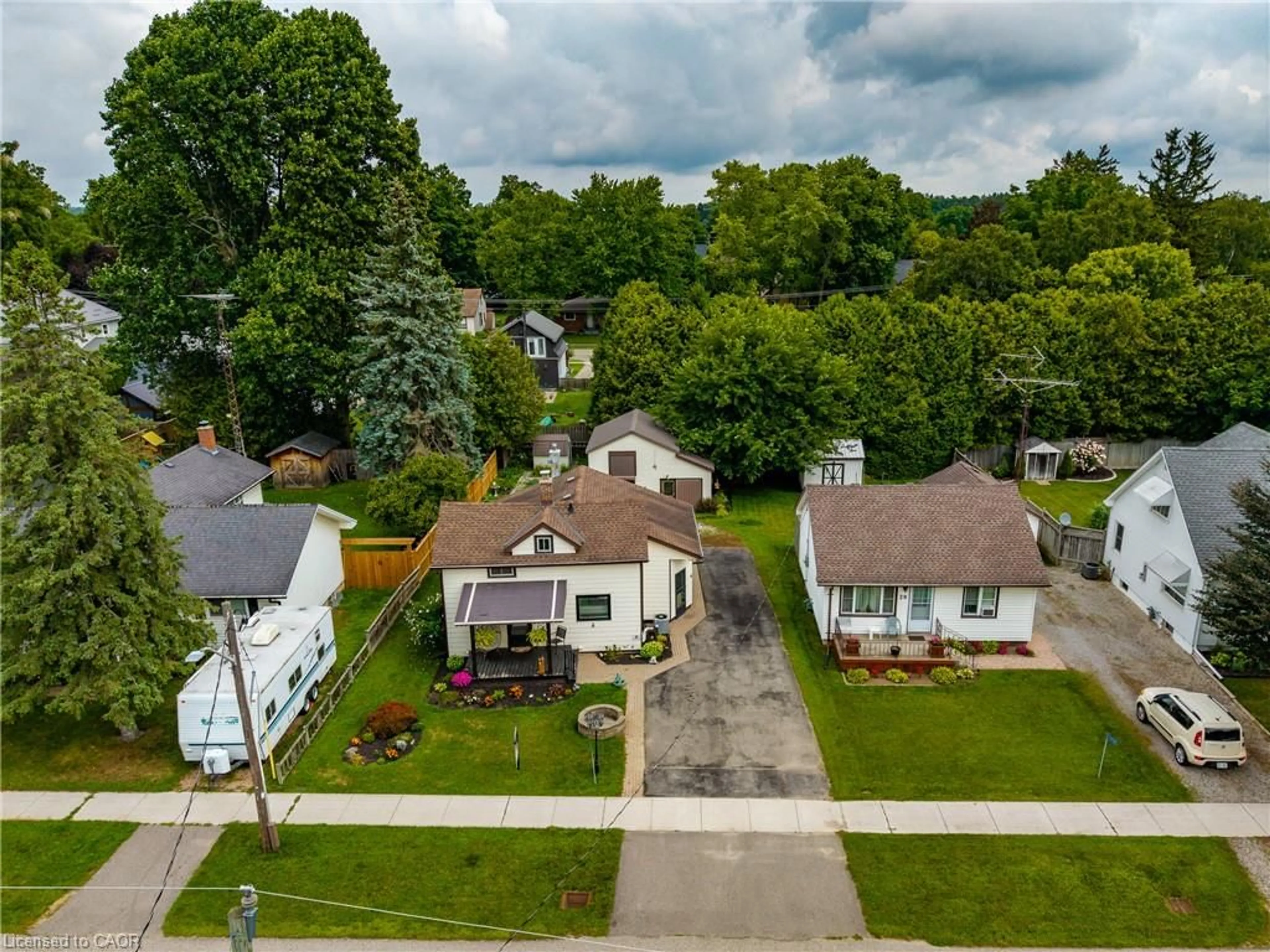 A pic from outside/outdoor area/front of a property/back of a property/a pic from drone, street for 55716 Main St, Straffordville Ontario N0J 1Y0