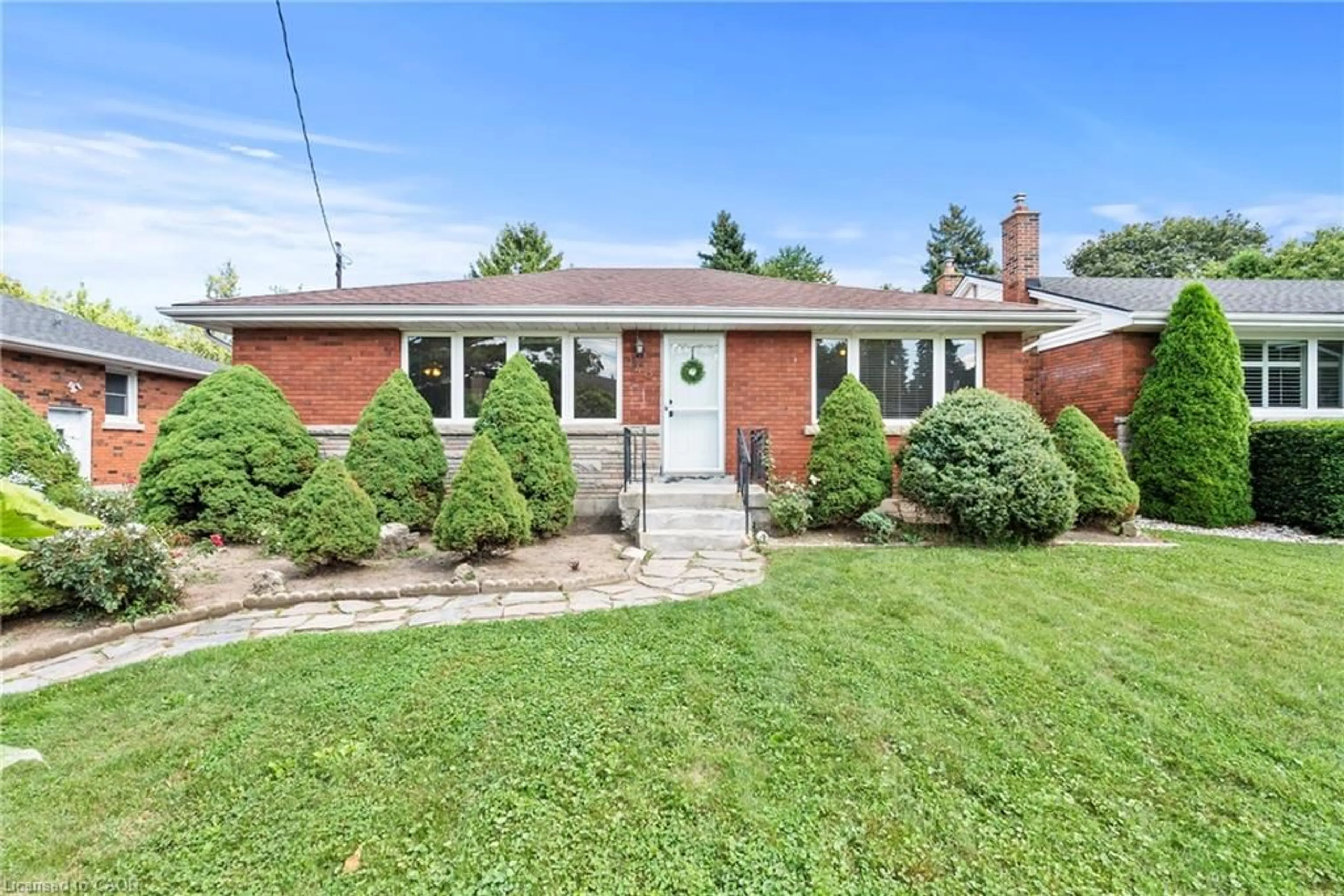 Home with brick exterior material, street for 143 West 25th St, Hamilton Ontario L8V 2H5