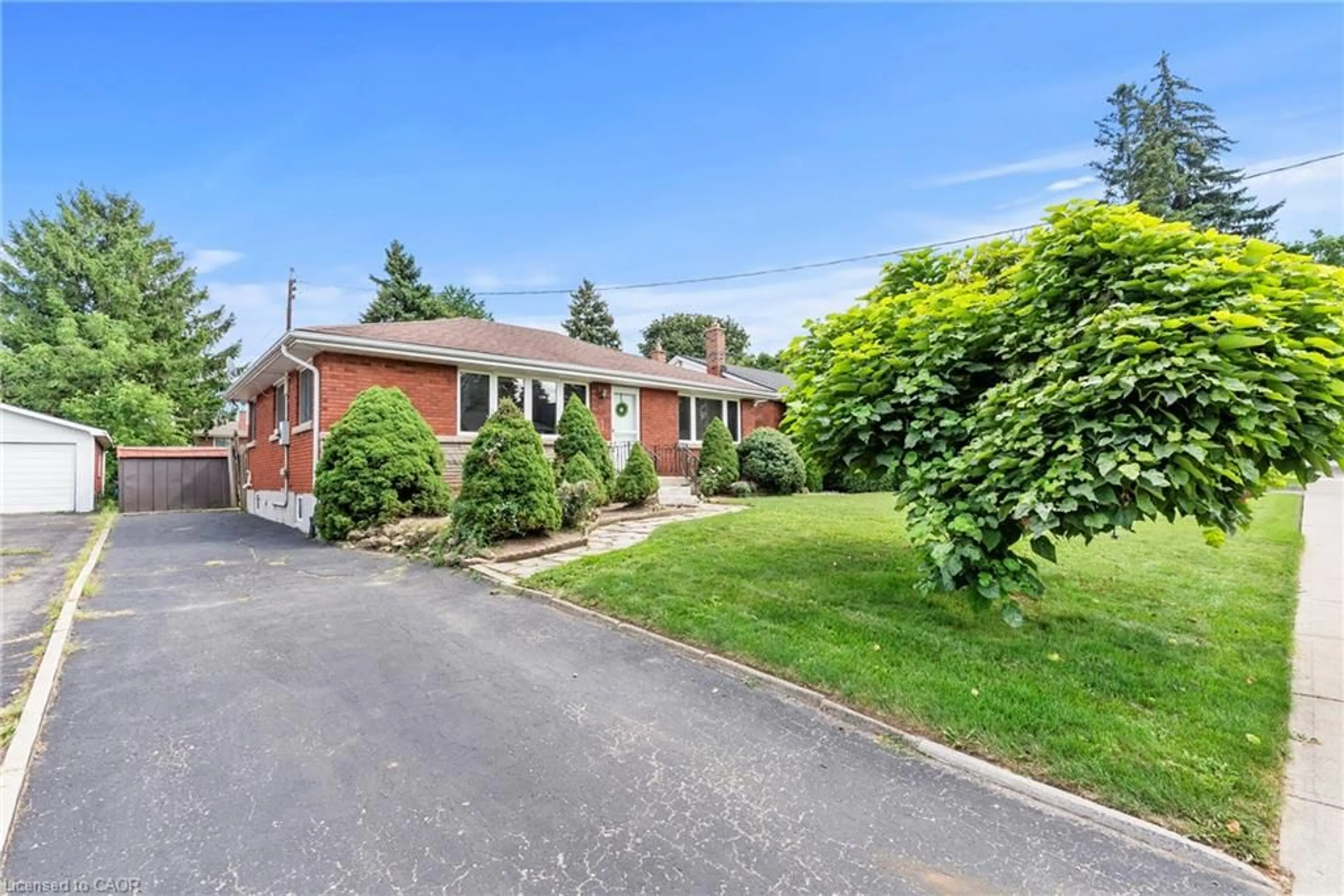 Home with brick exterior material, street for 143 West 25th St, Hamilton Ontario L9C 4X4