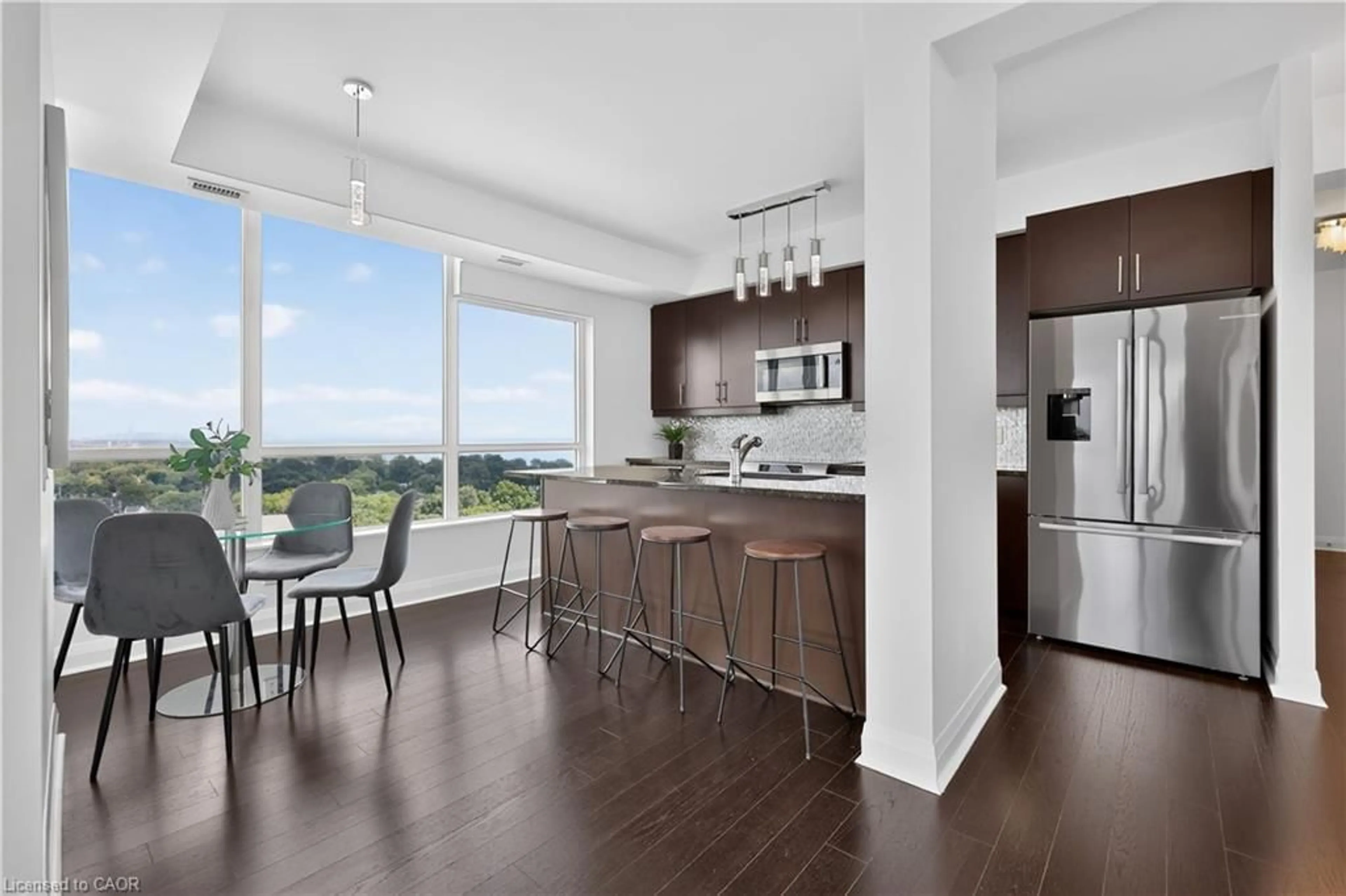Open concept kitchen, wood/laminate floor for 1 Hurontario St #1705, Mississauga Ontario L5G 0A3