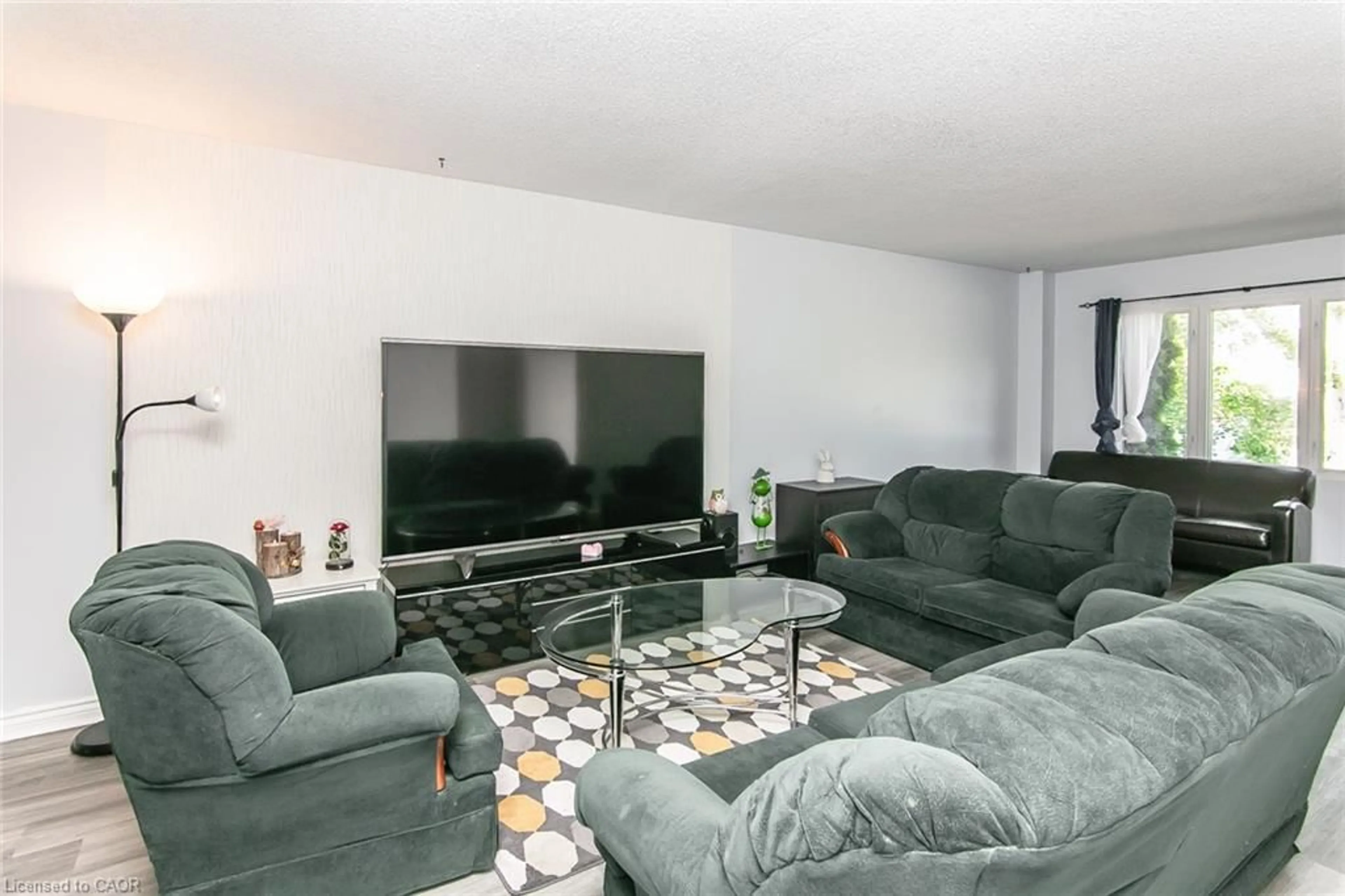 Living room with furniture, unknown for 513 Weber St N #C, Waterloo Ontario N2L 4G1