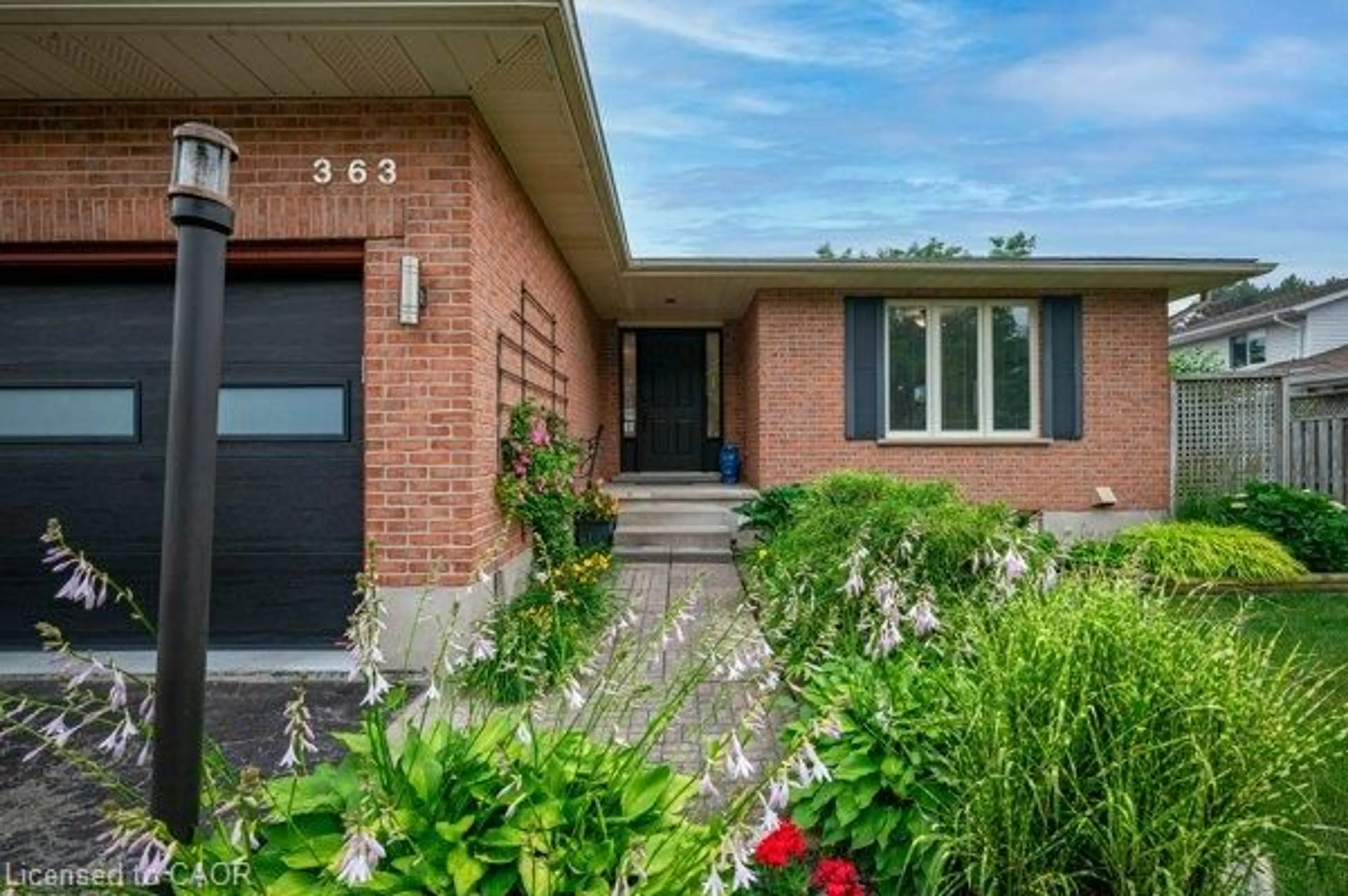 Home with brick exterior material, street for 363 Twinflower Cres, Waterloo Ontario N2V 1X2