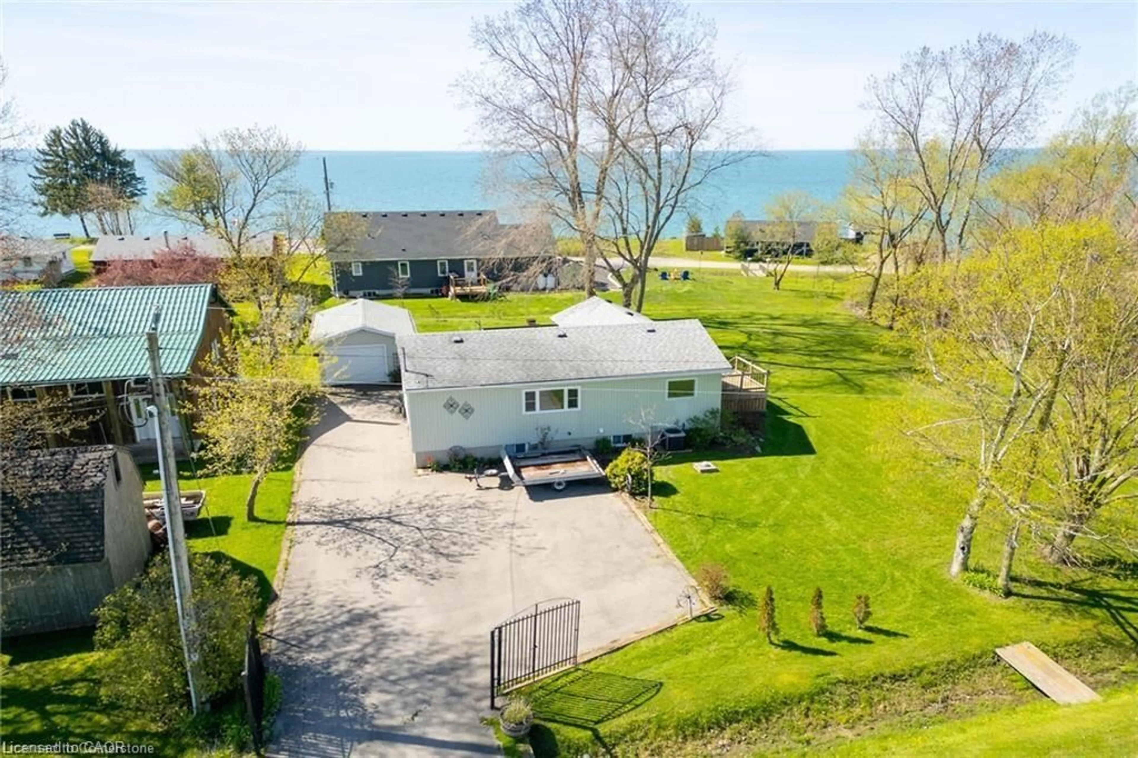 A pic from outside/outdoor area/front of a property/back of a property/a pic from drone, water/lake/river/ocean view for 2970 Lakeshore Rd, Dunnville Ontario N1A 2W8
