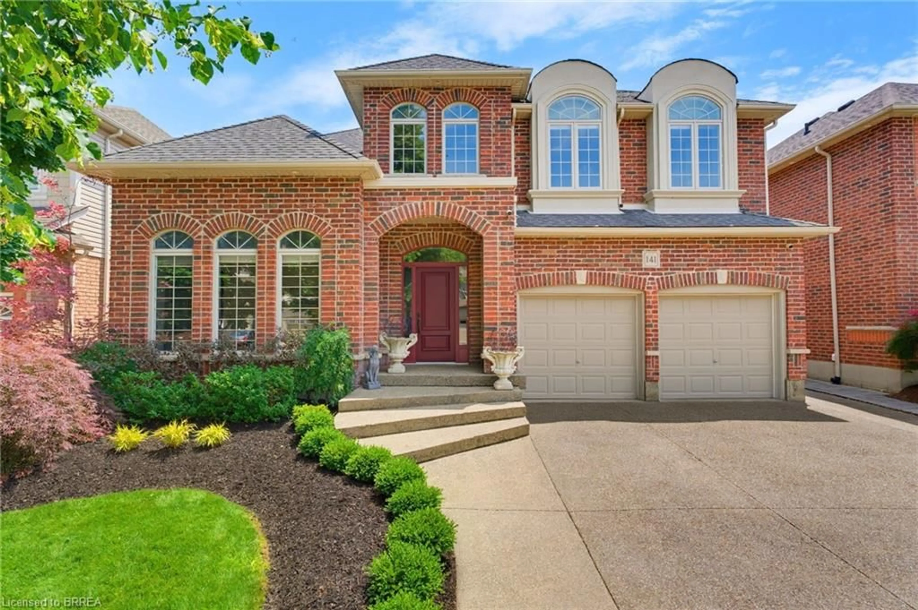Home with brick exterior material, street for 141 Falconridge Dr, Kitchener Ontario N2K 4J9