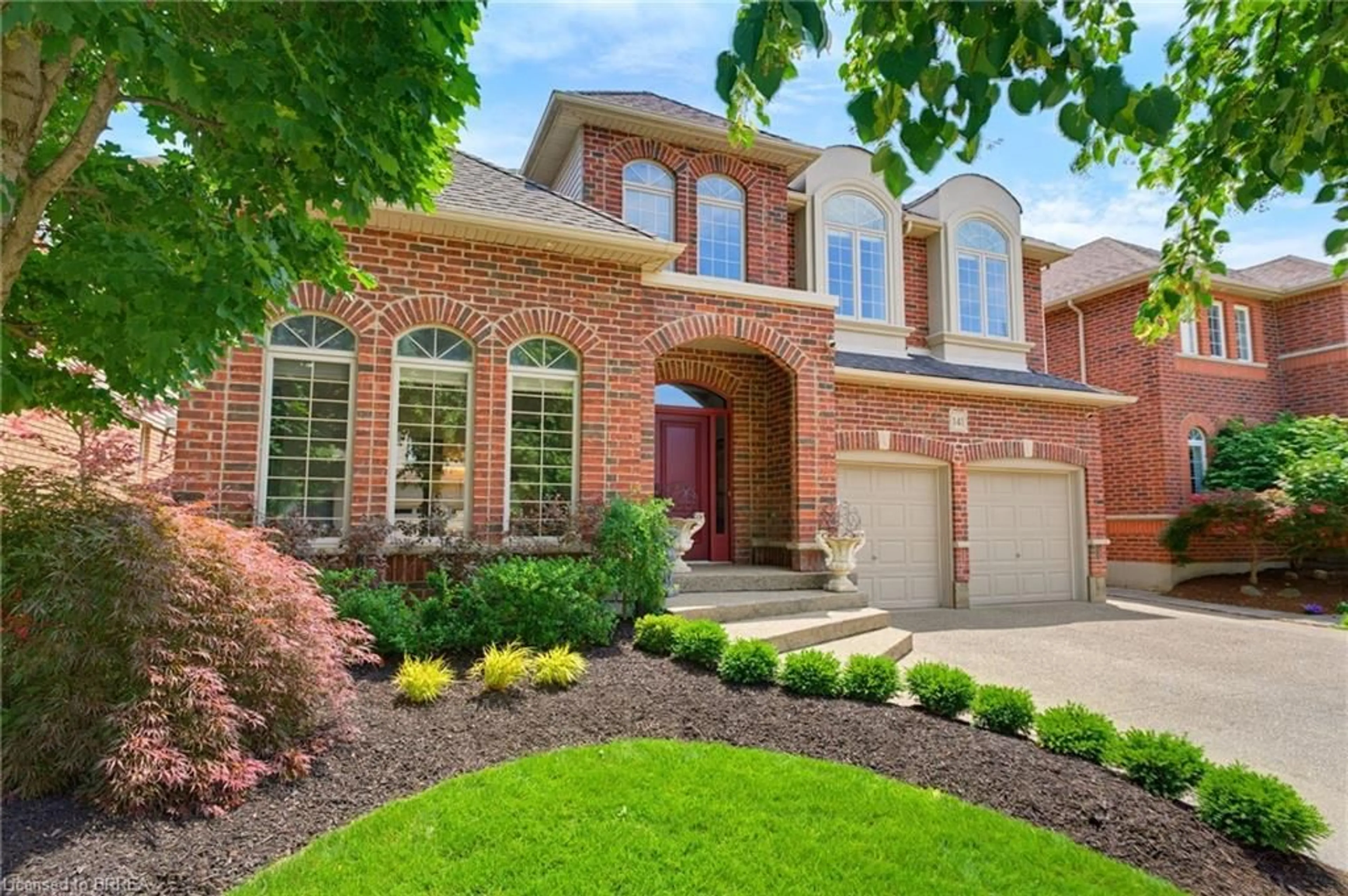 Home with brick exterior material, street for 141 Falconridge Dr, Kitchener Ontario N2K 4J9