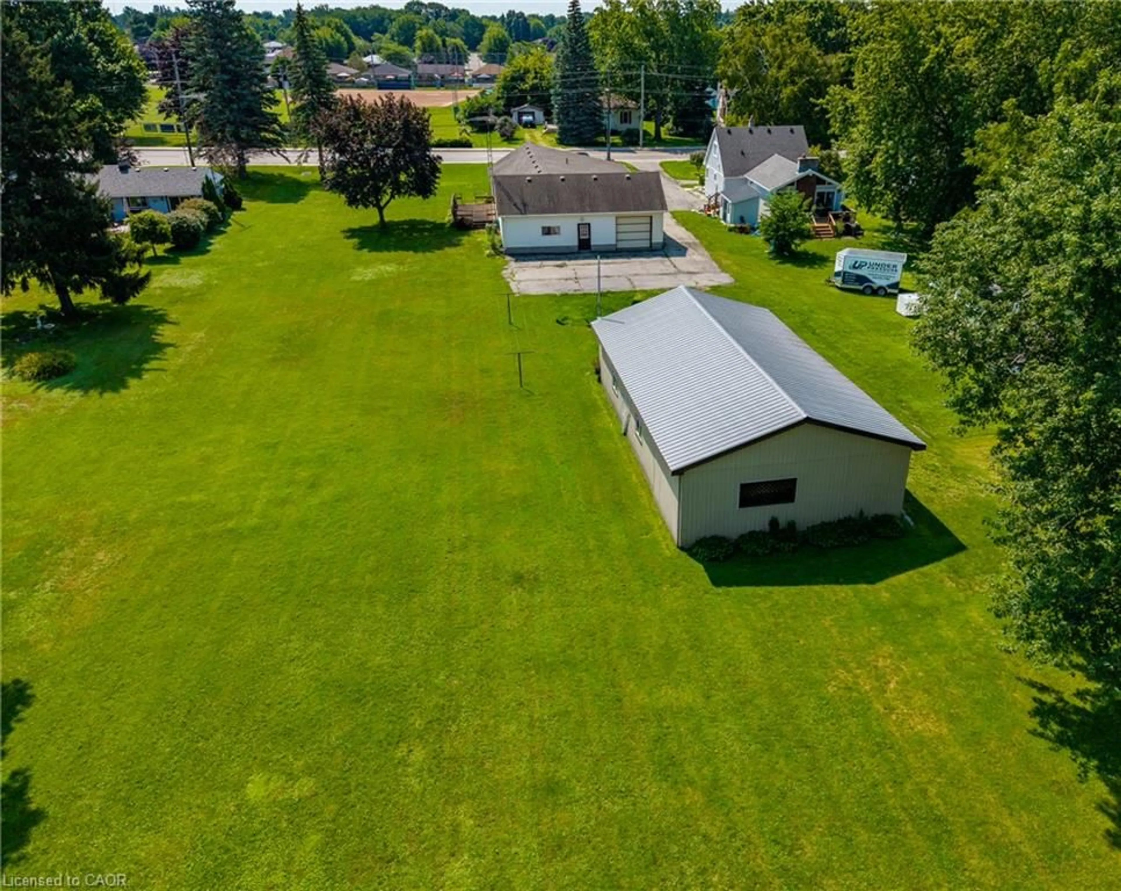 A pic from outside/outdoor area/front of a property/back of a property/a pic from drone, unknown for 1030 Main St, Port Dover Ontario N0A 1N2
