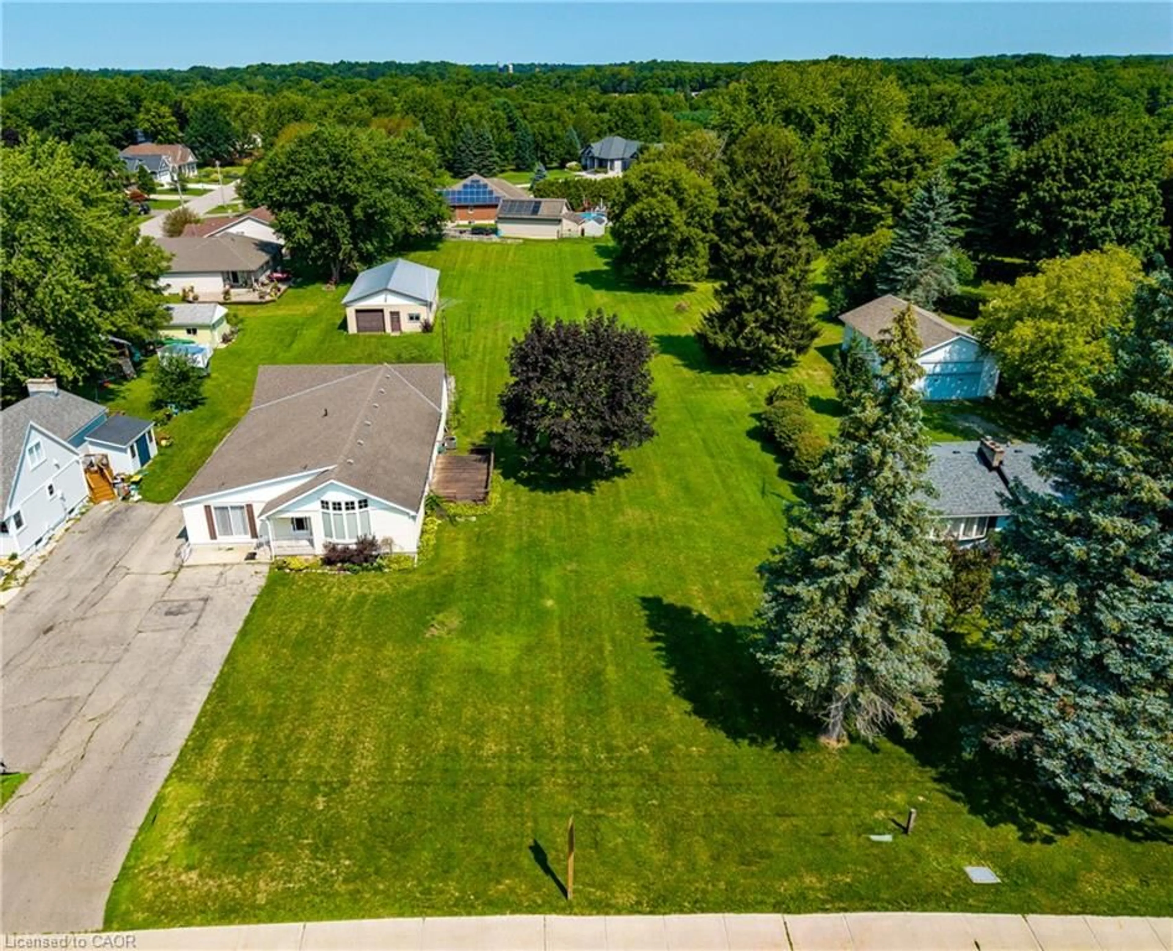 A pic from outside/outdoor area/front of a property/back of a property/a pic from drone, street for 1030 Main St, Port Dover Ontario N0A 1N2