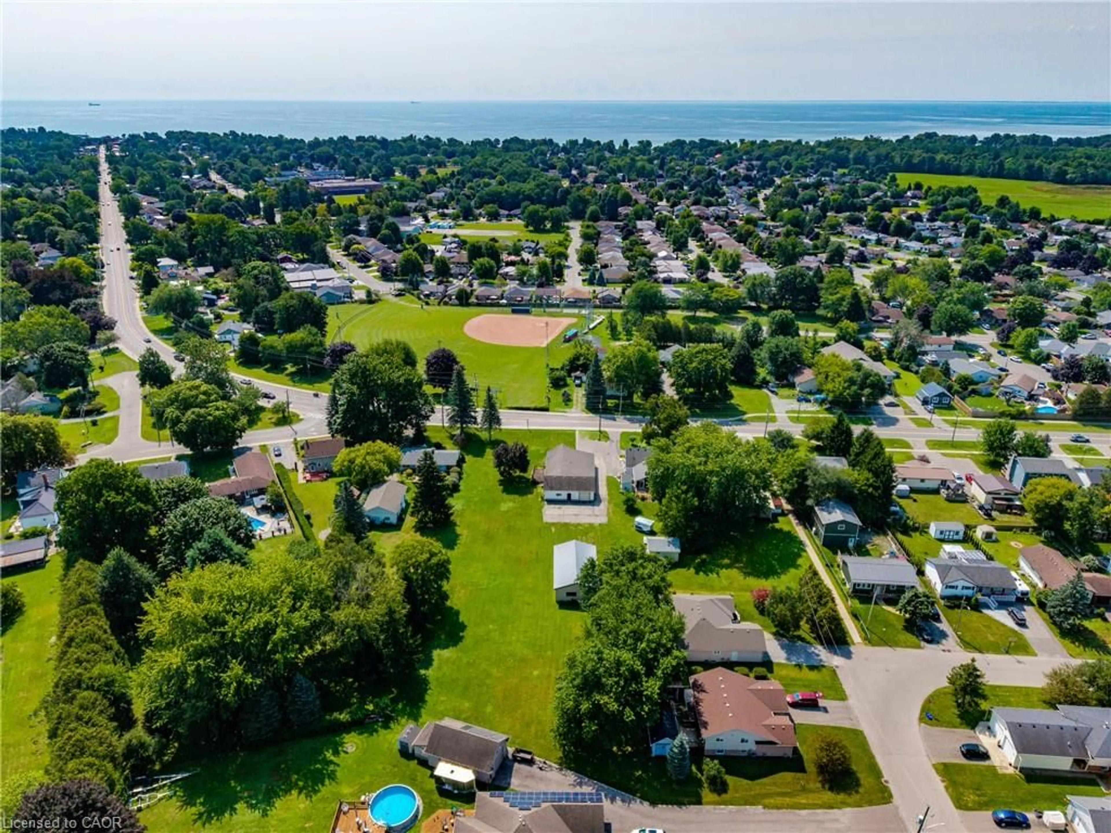 A pic from outside/outdoor area/front of a property/back of a property/a pic from drone, water/lake/river/ocean view for 1030 Main St, Port Dover Ontario N0A 1N2